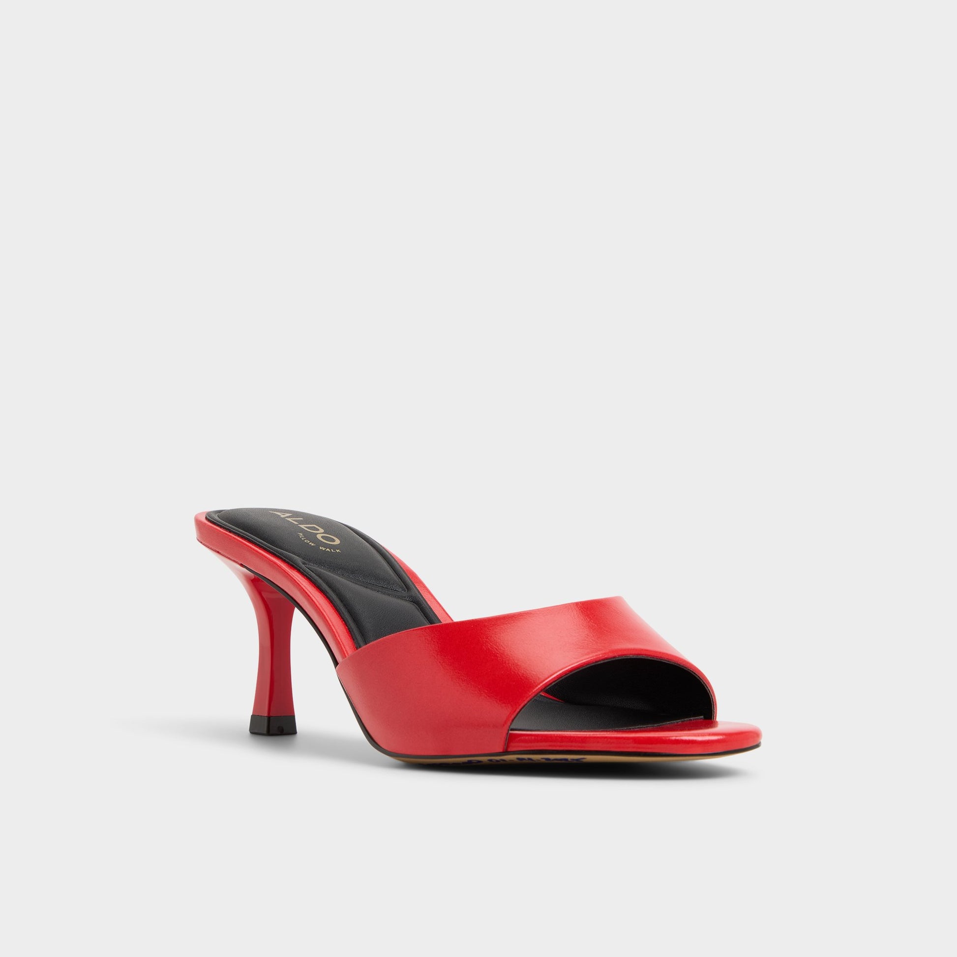 Three-quarter angle of Bright red Annaberaen Heeled mule's front side