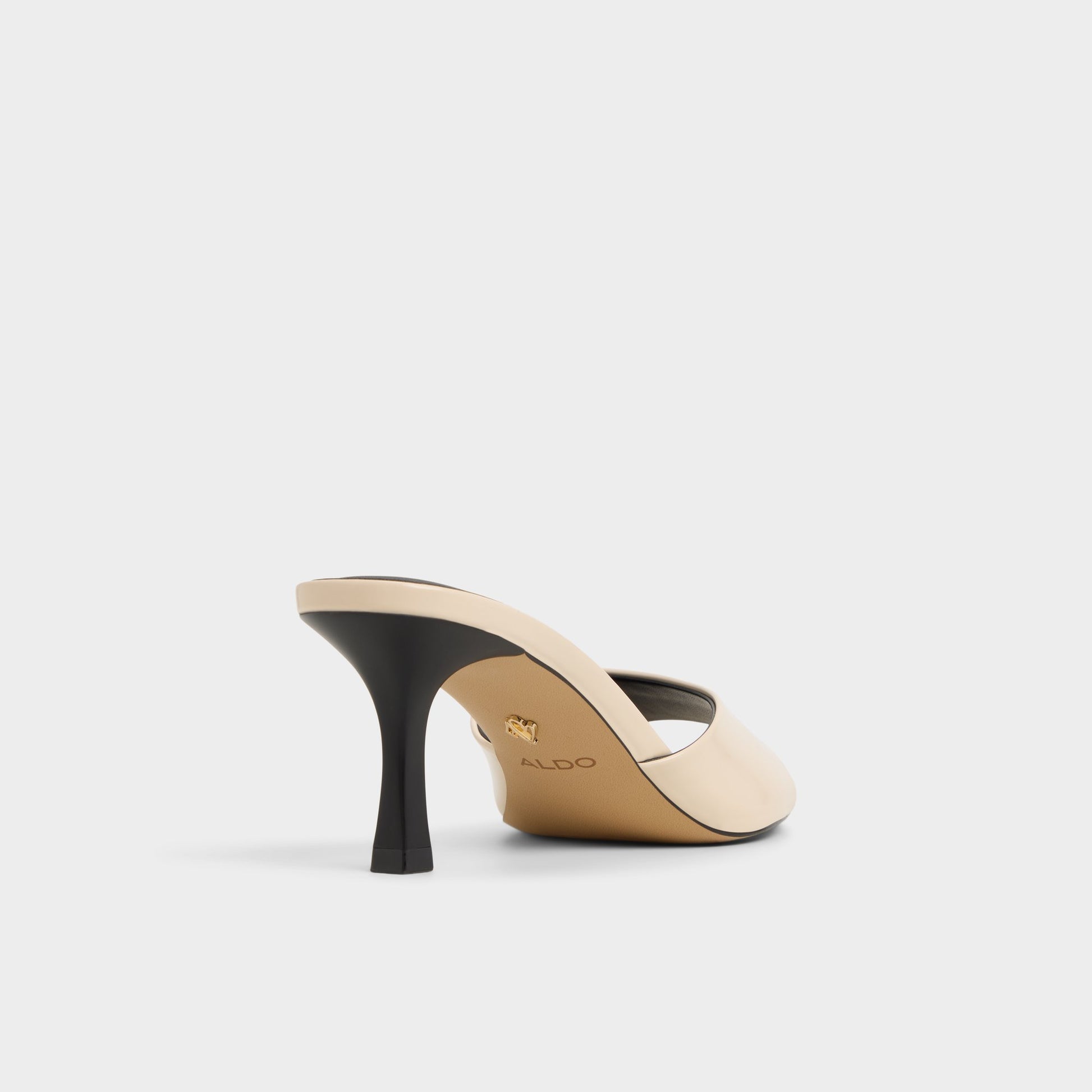 Three-quarter angle of Light Beige Annaberaen Heeled mule's back side