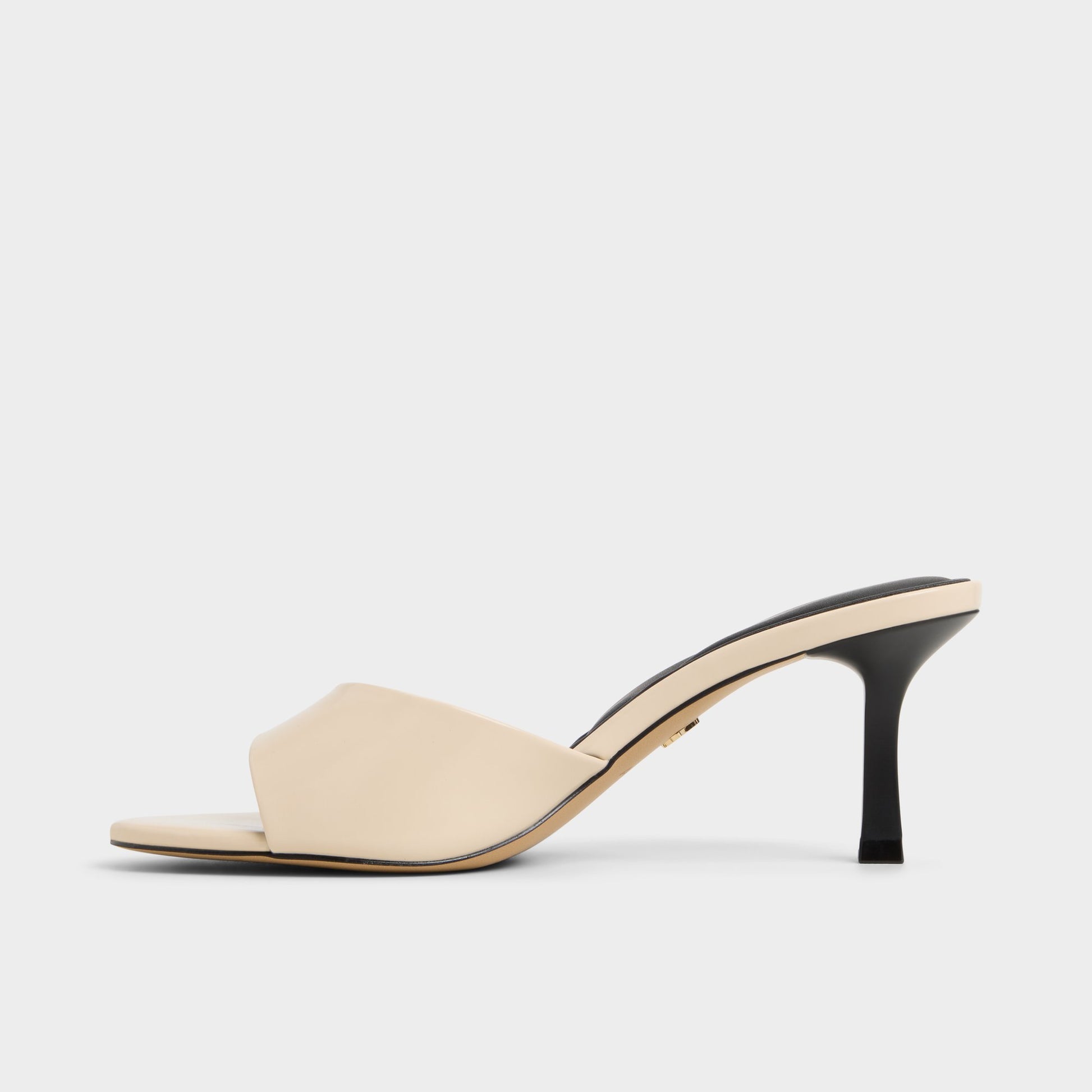 Side view of Light Beige Annaberaen Heeled mule