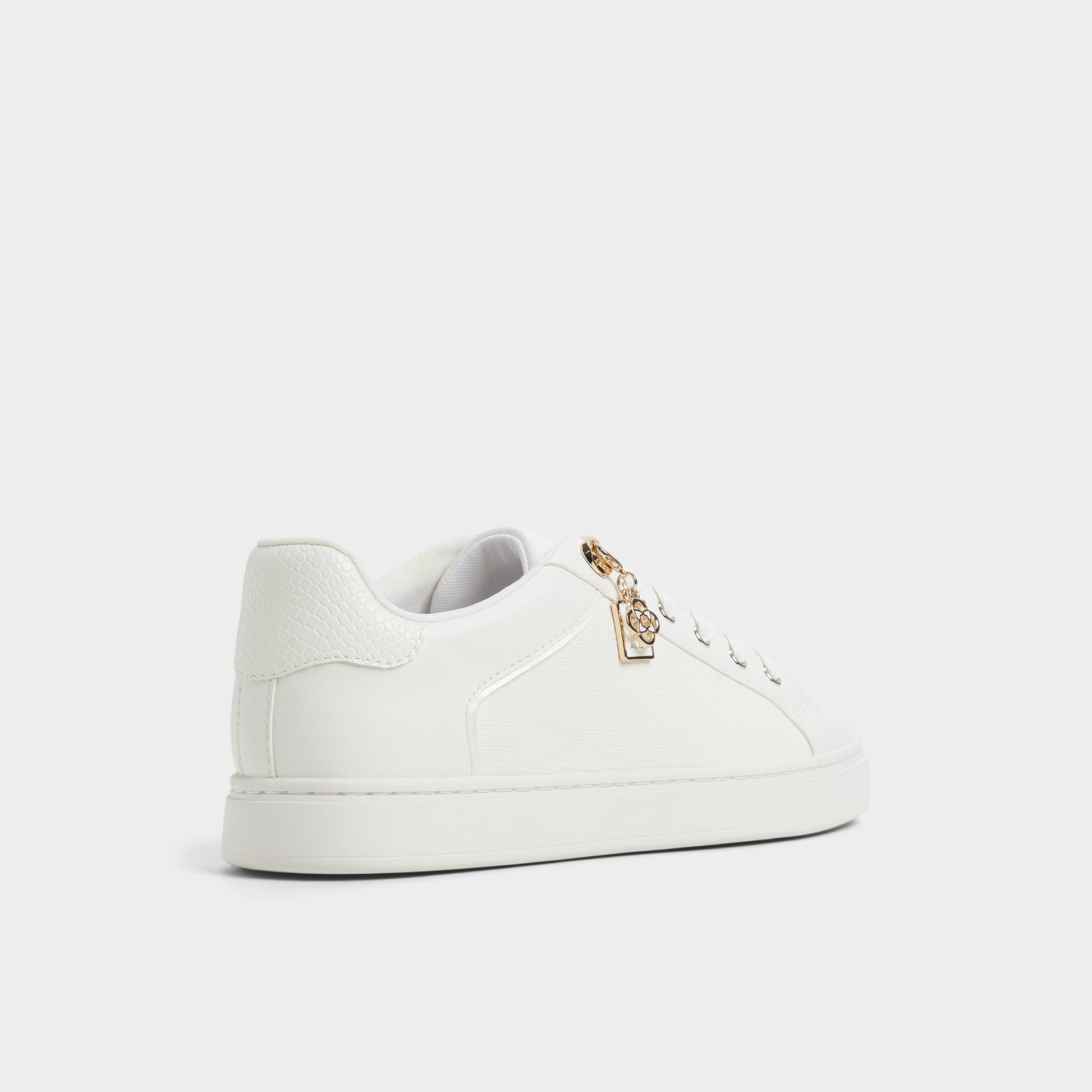 Three-quarter angle of White Elgata Sneaker's back side