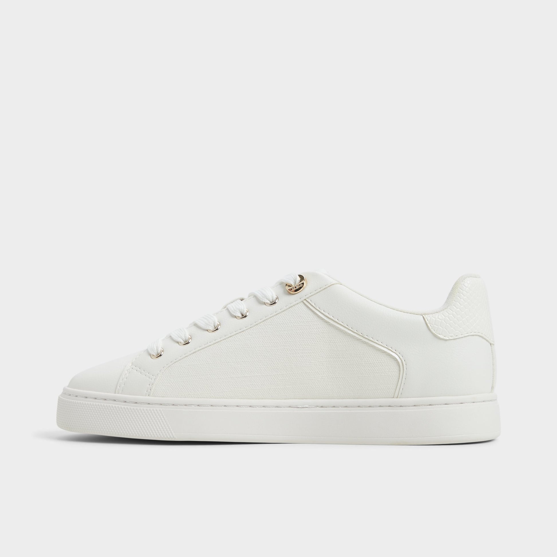 Side view of White Elgata Sneaker