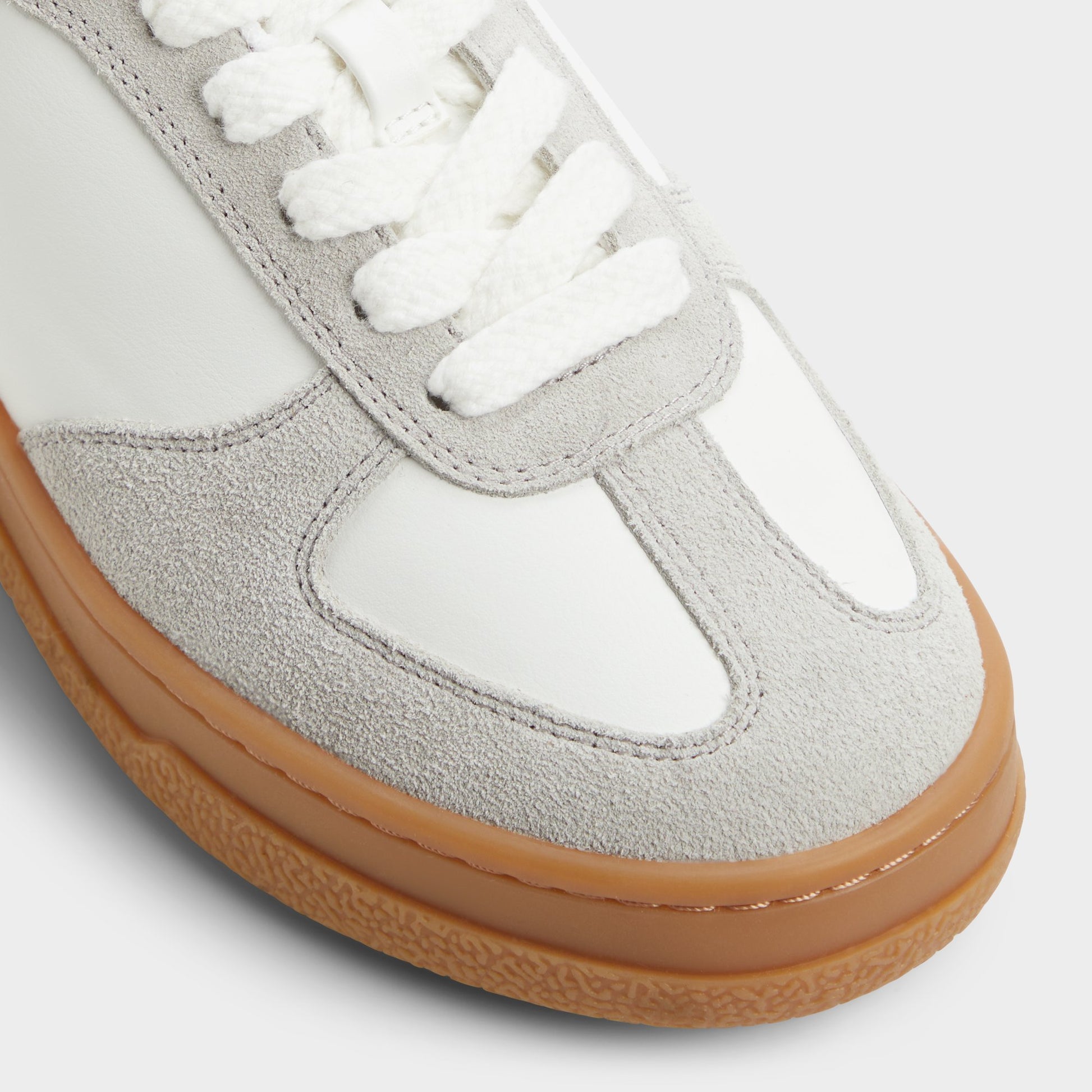 Close-up of the White/Grey Deevale Sneaker