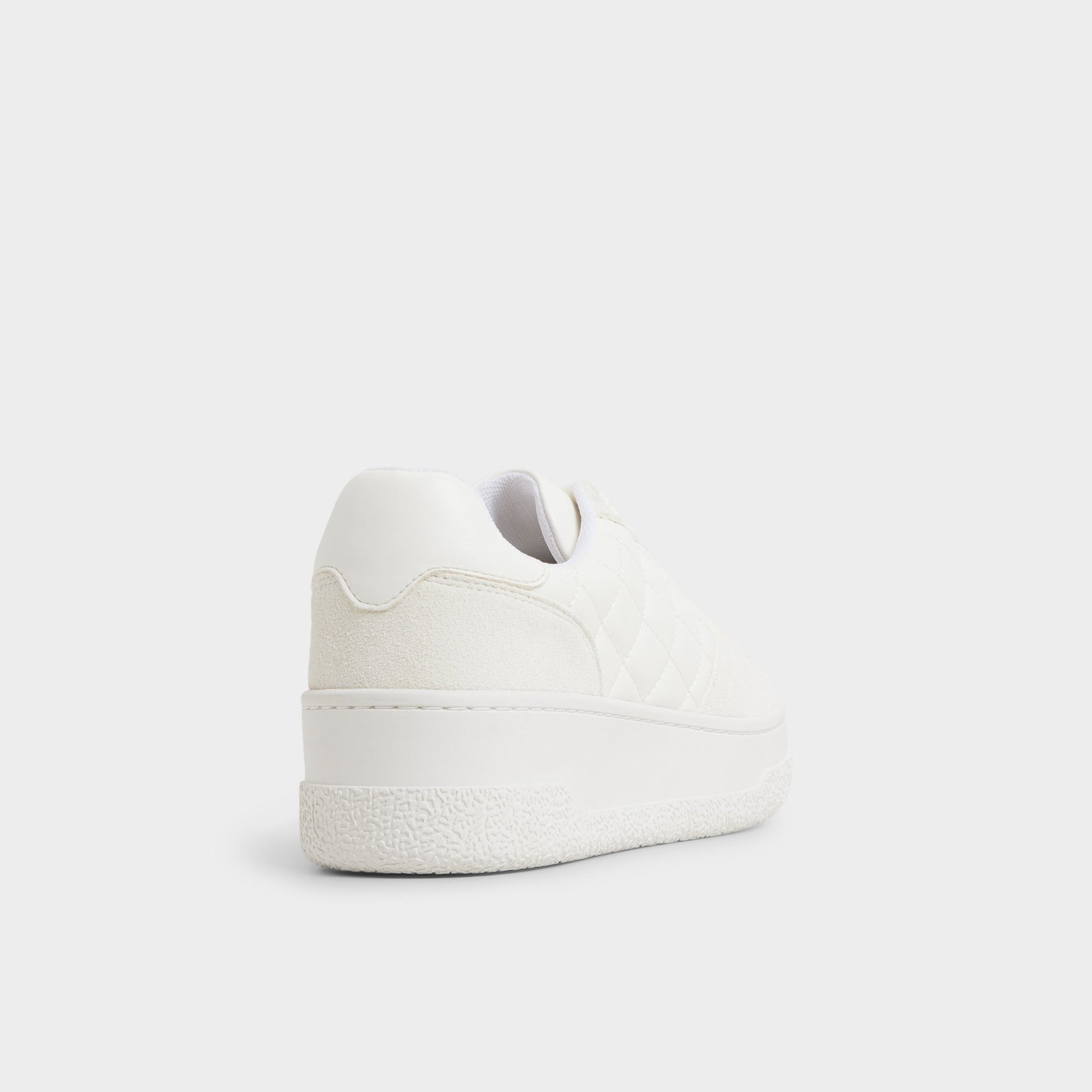 Three-quarter angle of White Deevale Sneaker's back side