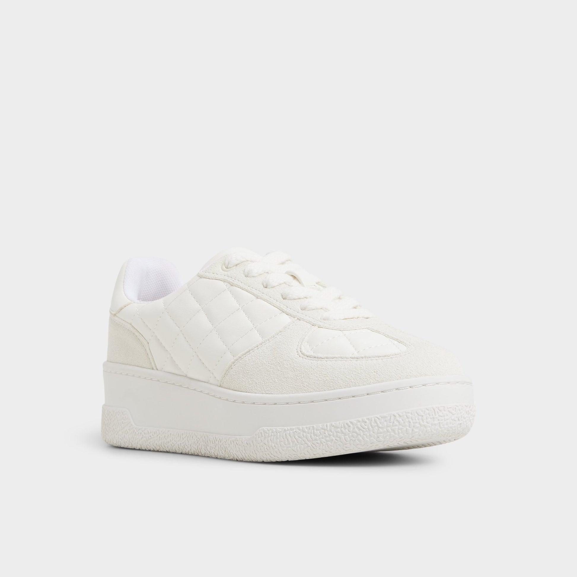 Three-quarter angle of White Deevale Sneaker's front side