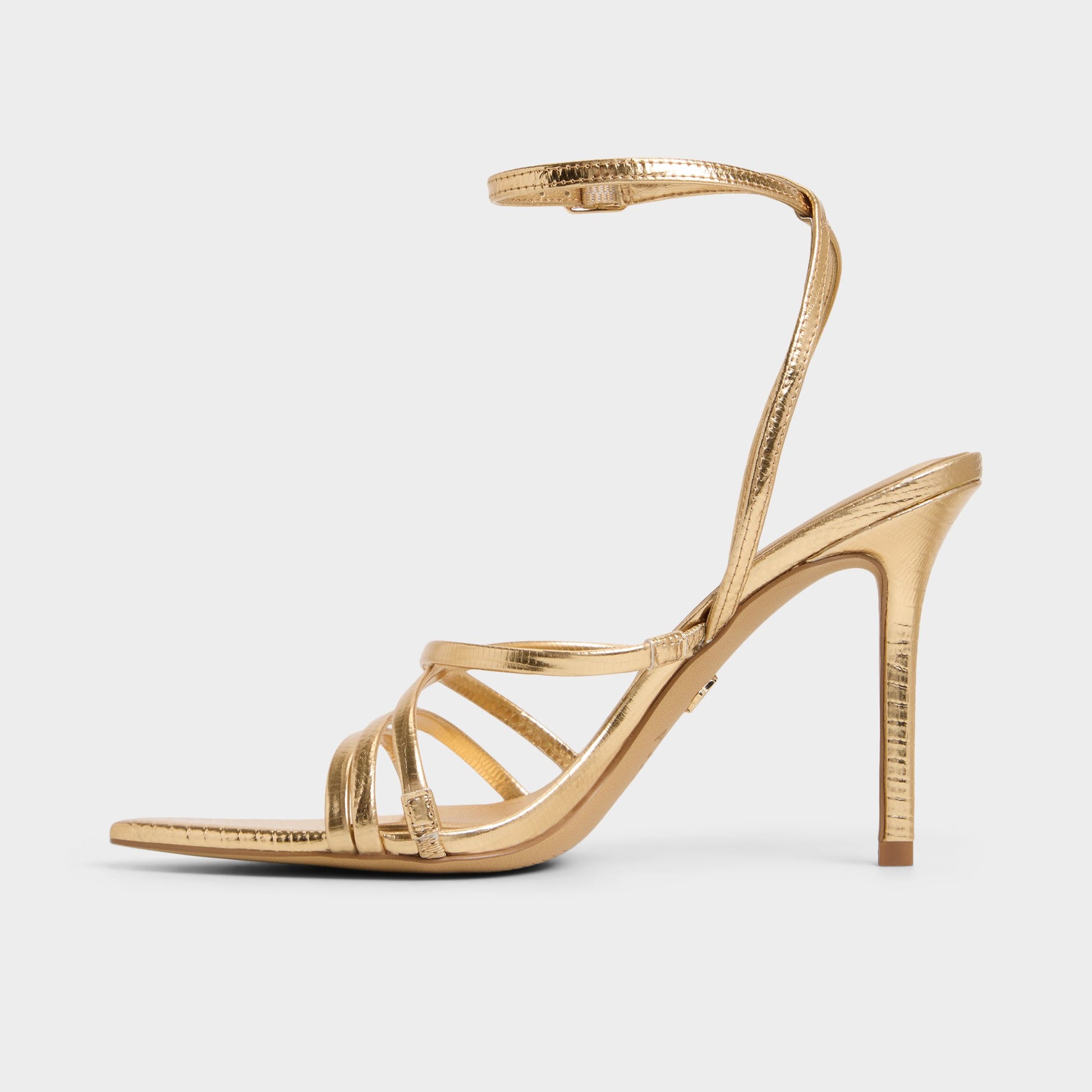 Side view of Gold Solania Strappy heeled sandal