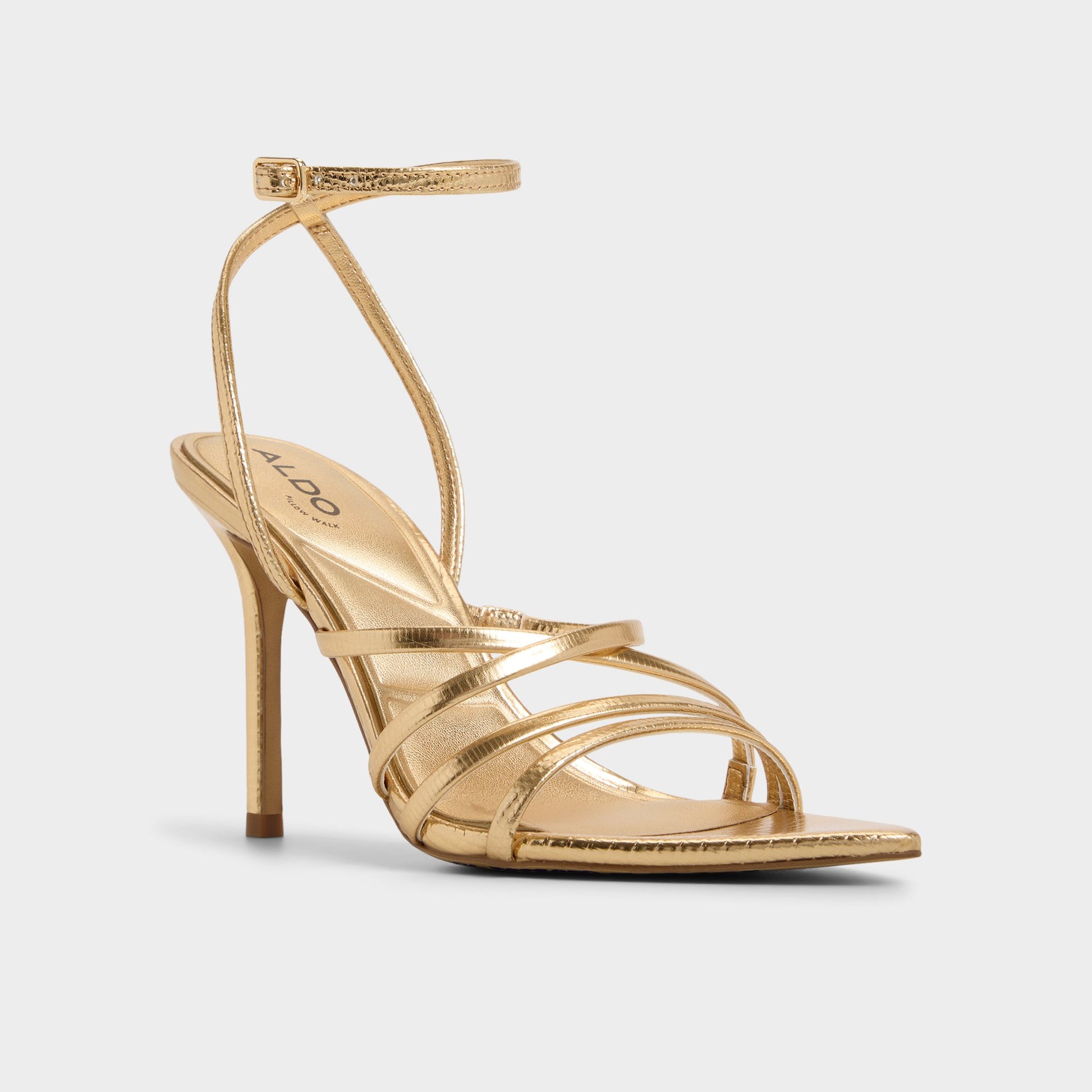 Three-quarter angle of Gold Solania Strappy heeled sandal's front side