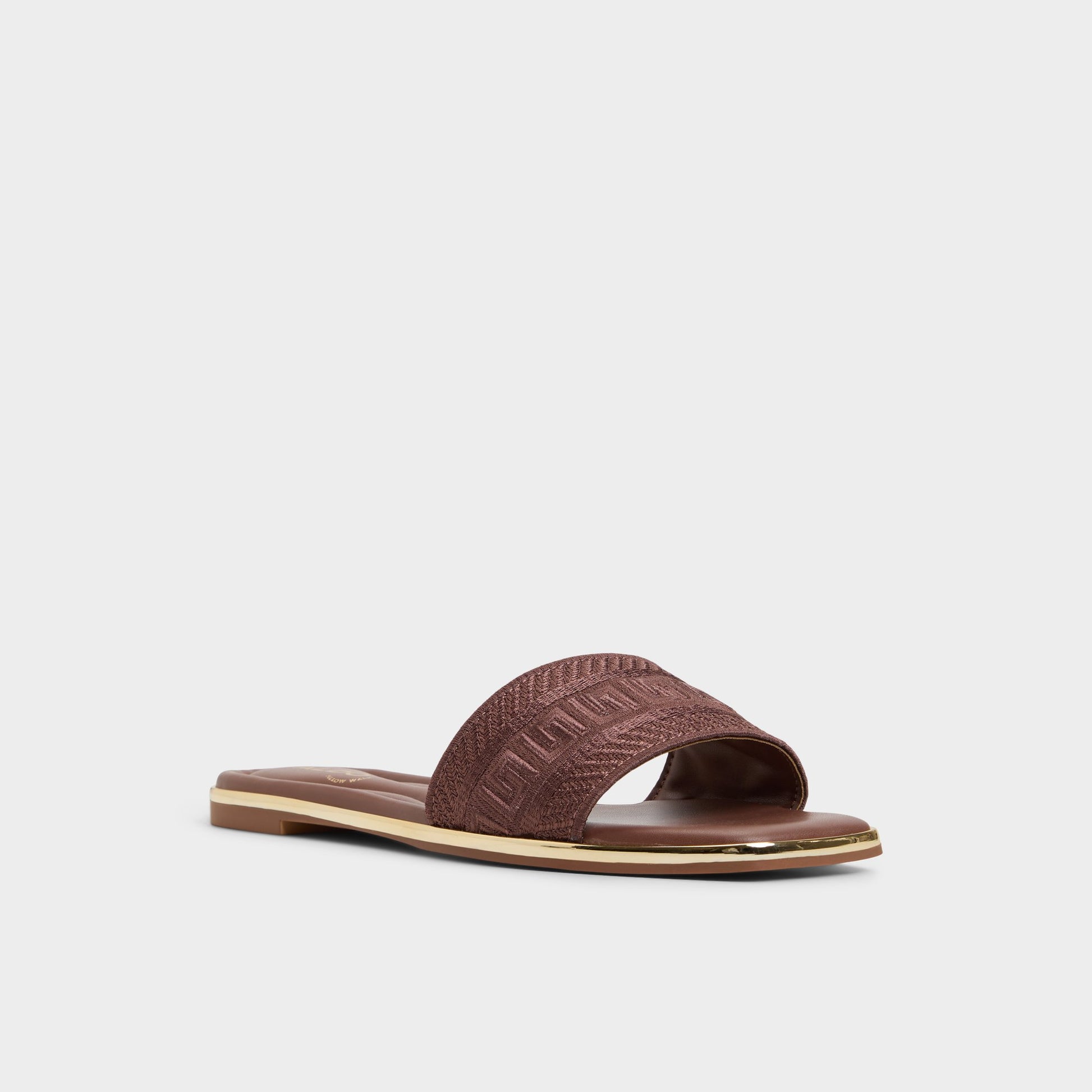 Three-quarter angle of Medium Brown Oceania Slide sandal's front side