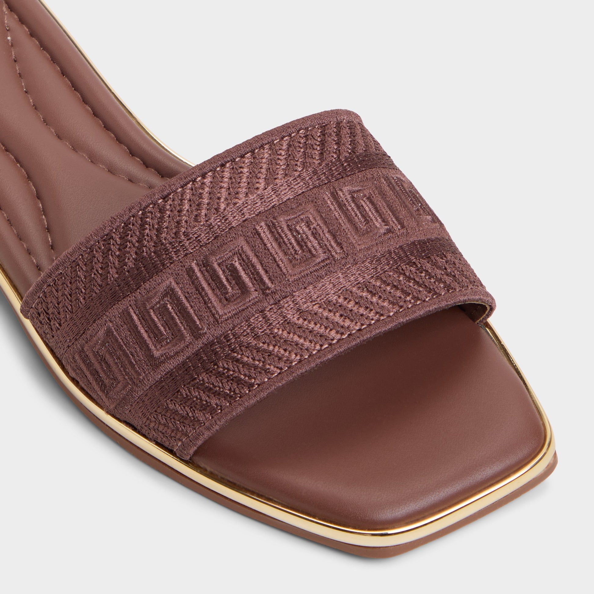 Close-up of the Medium Brown Oceania Slide sandal