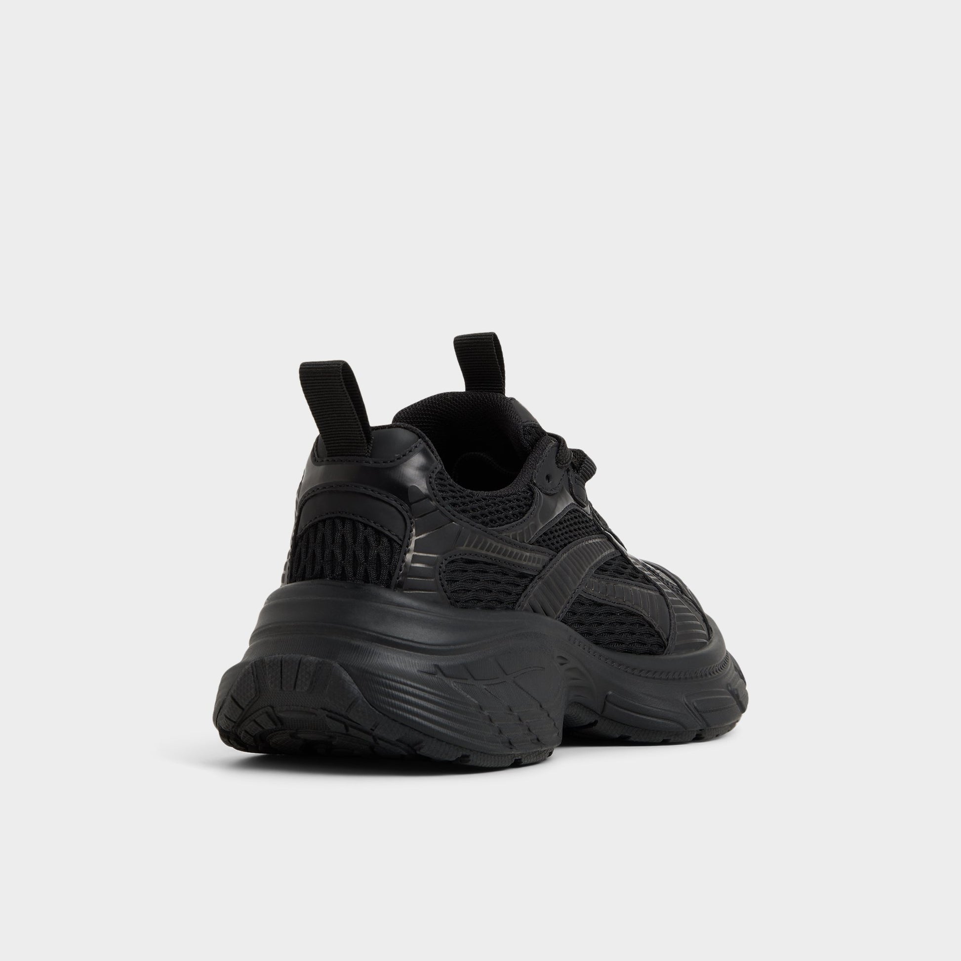 Three-quarter angle of Black Powerplay Sneaker's back side