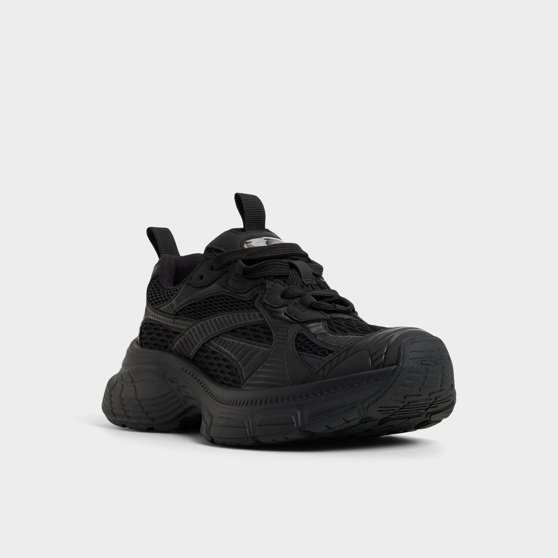 Three-quarter angle of Black Powerplay Sneaker's front side