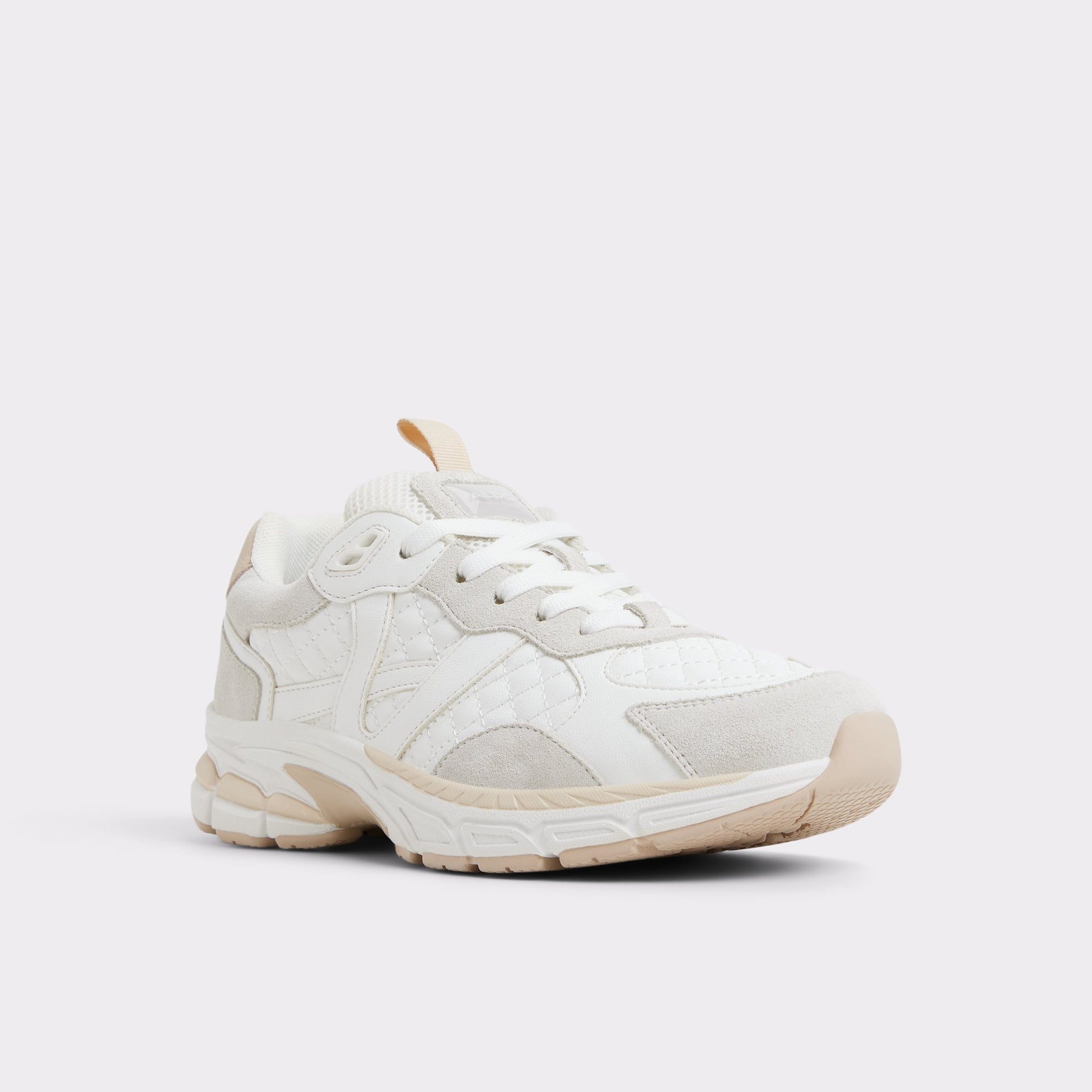 Three-quarter angle of White Pillowsnkr-l Jogger sneaker's front side