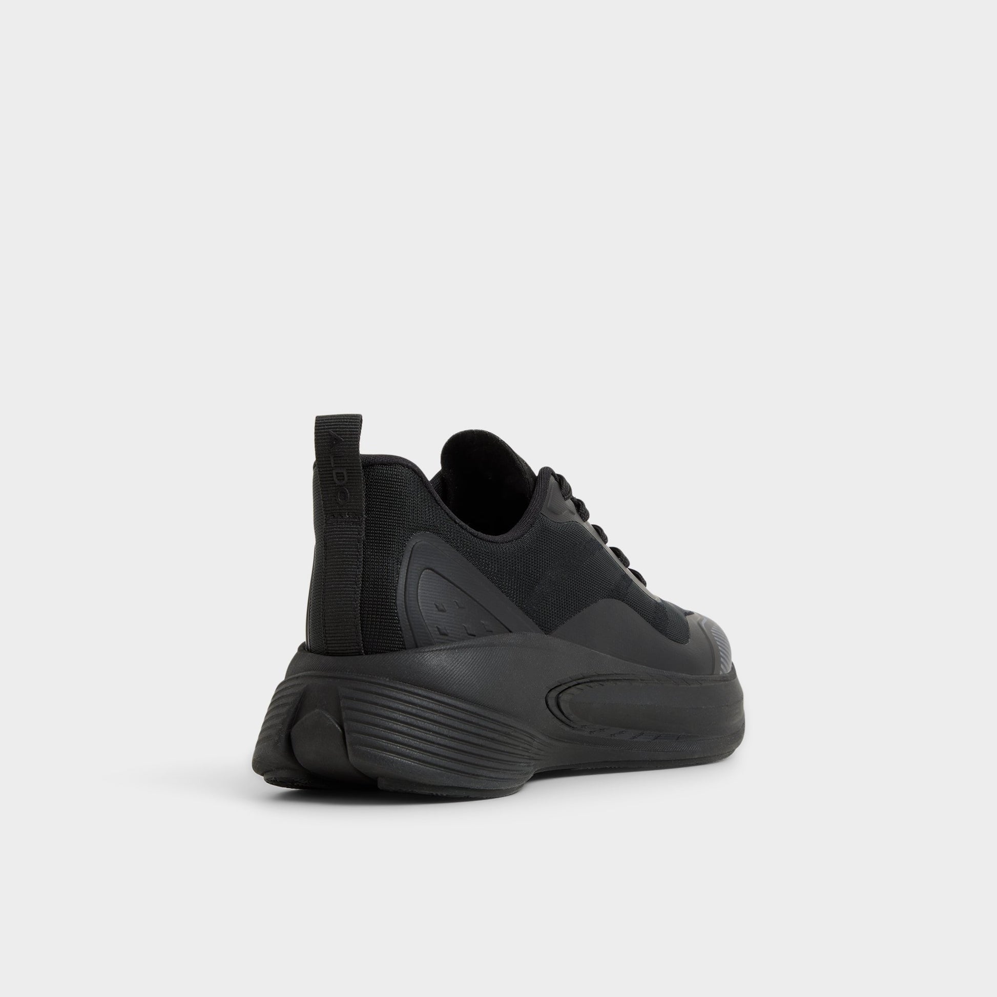 Three-quarter angle of Black Pillowstep Sneaker's back side