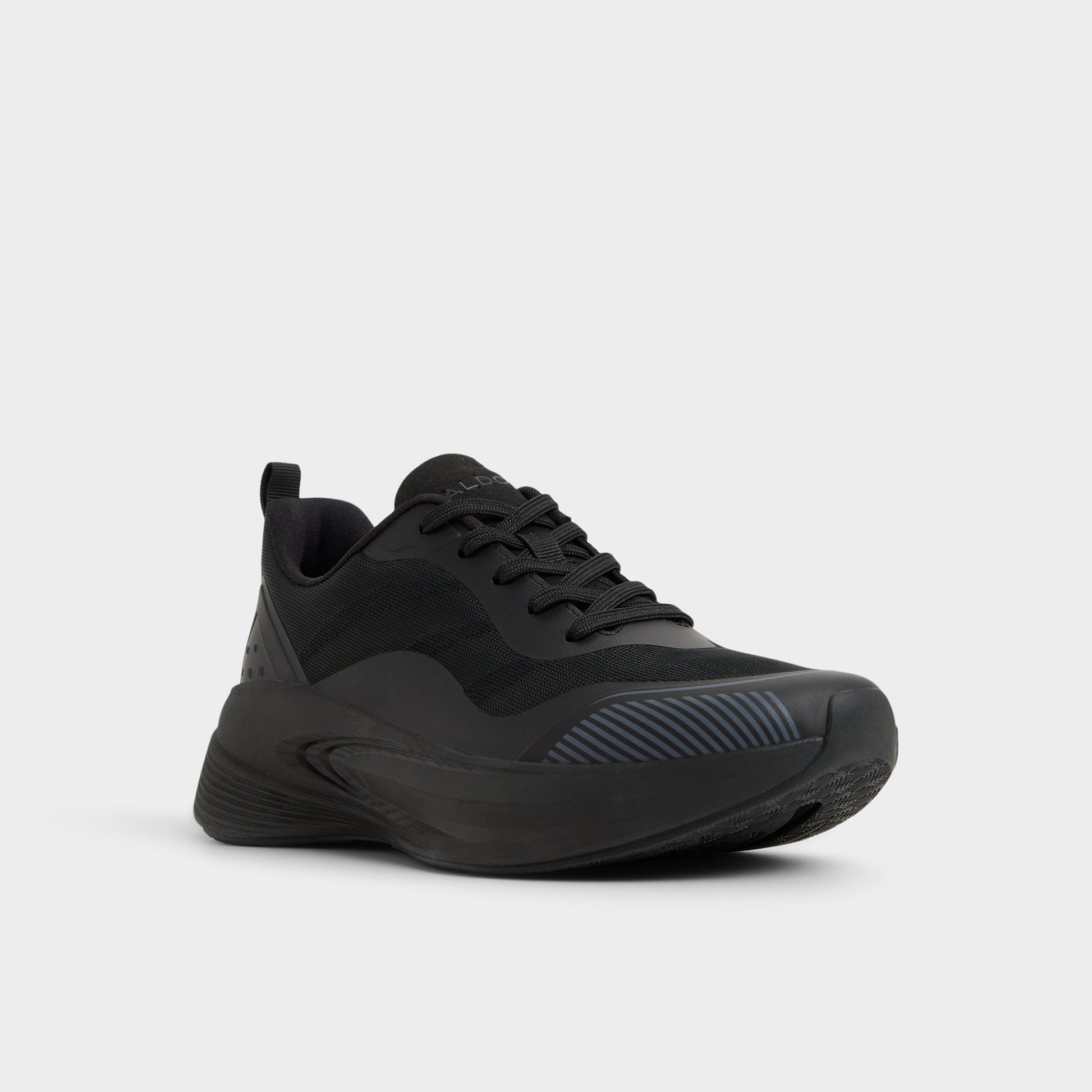 Three-quarter angle of Black Pillowstep Sneaker's front side