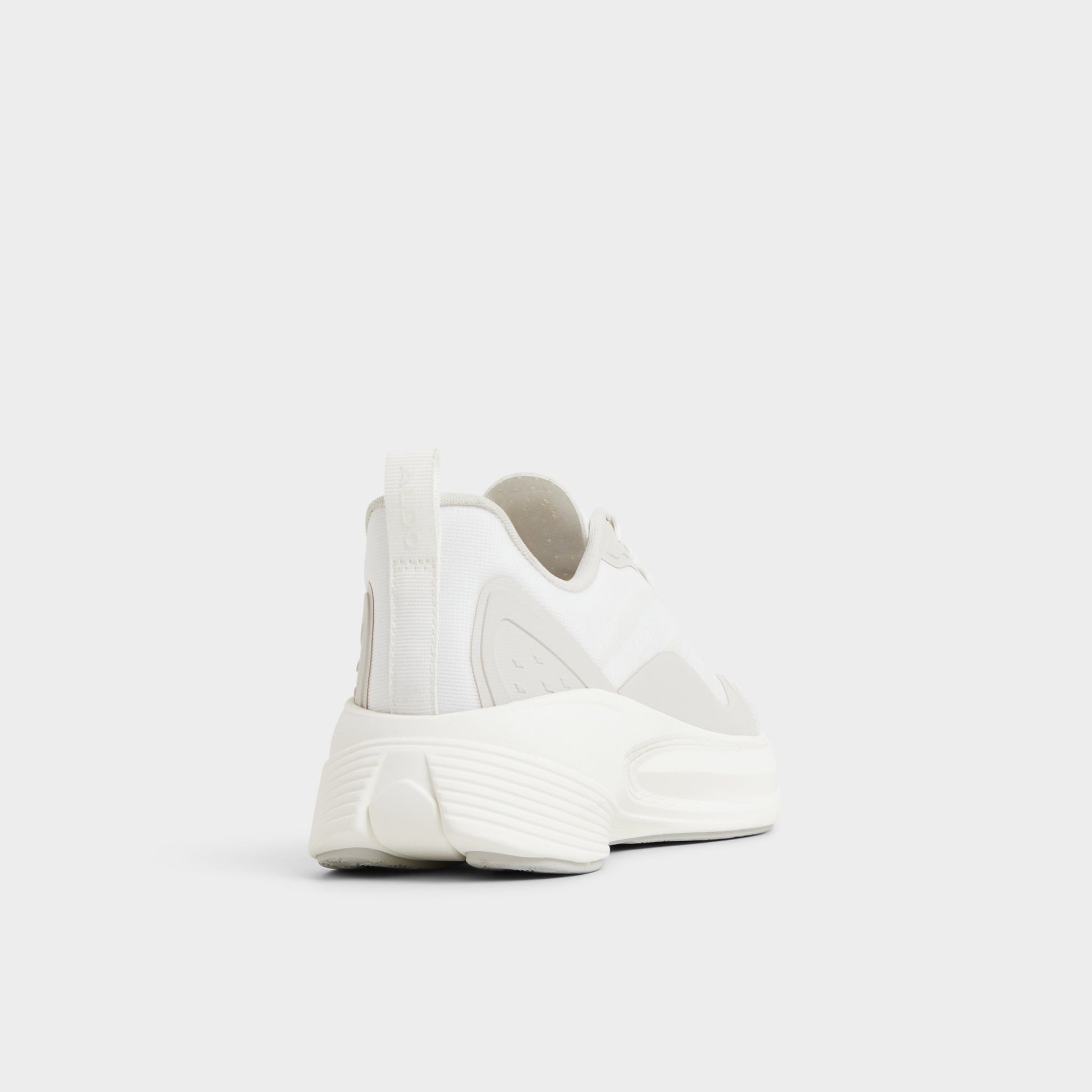 Three-quarter angle of White Pillowstep Sneaker's back side