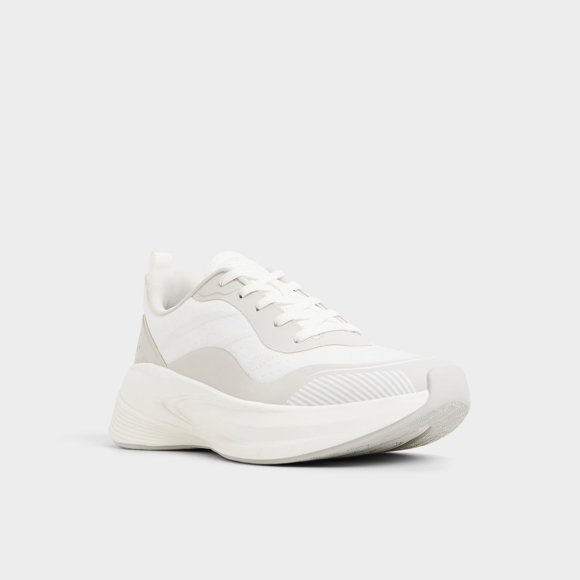 Three-quarter angle of White Pillowstep Sneaker's front side