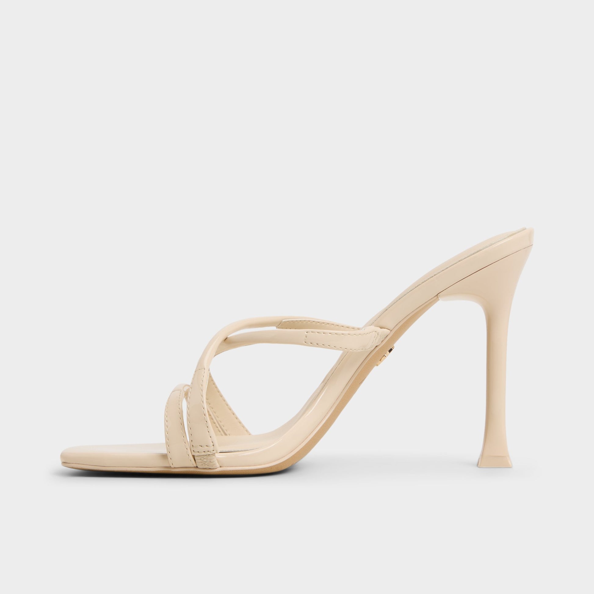 Side view of Light Beige Velaia Heeled mule
