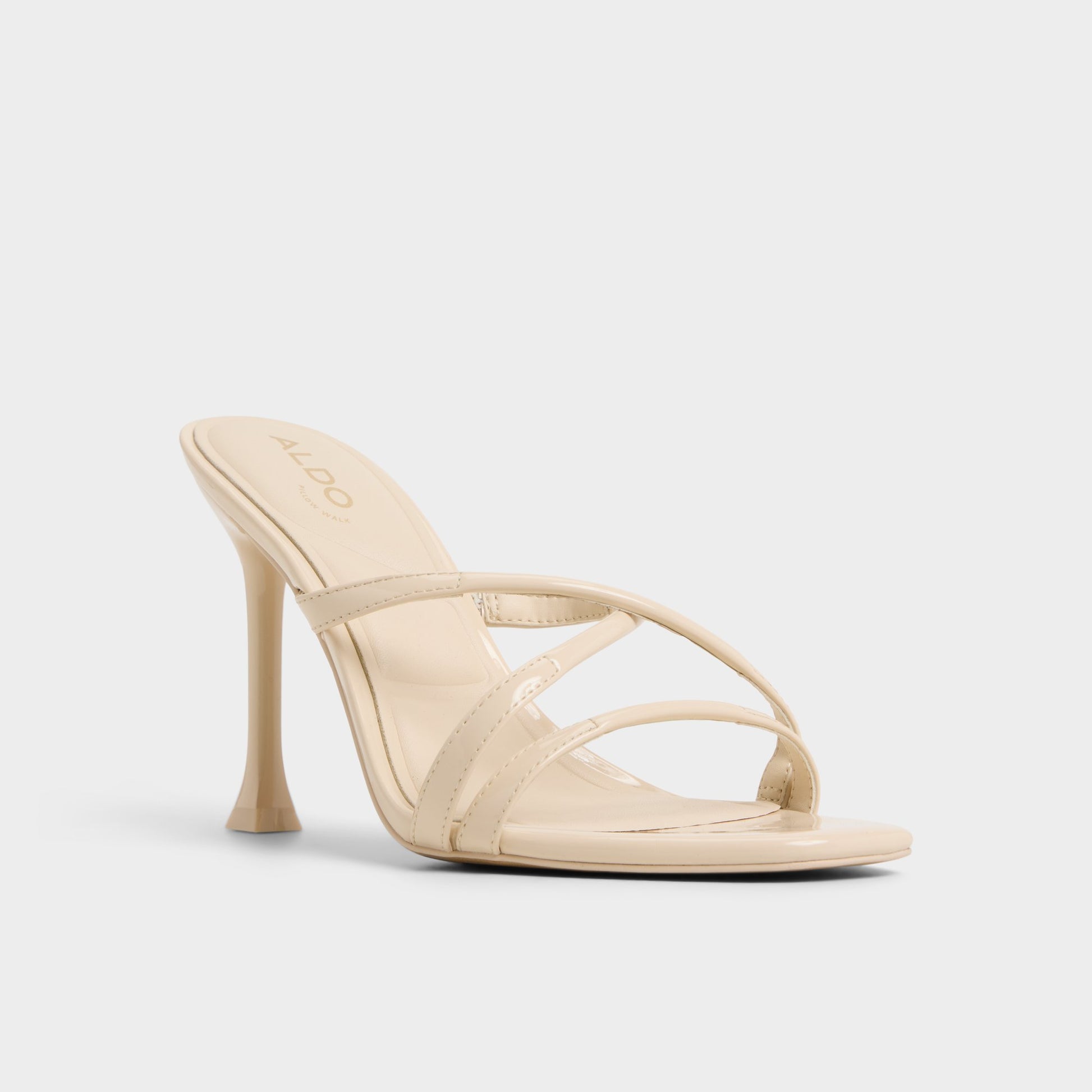 Three-quarter angle of Light Beige Velaia Heeled mule's front side
