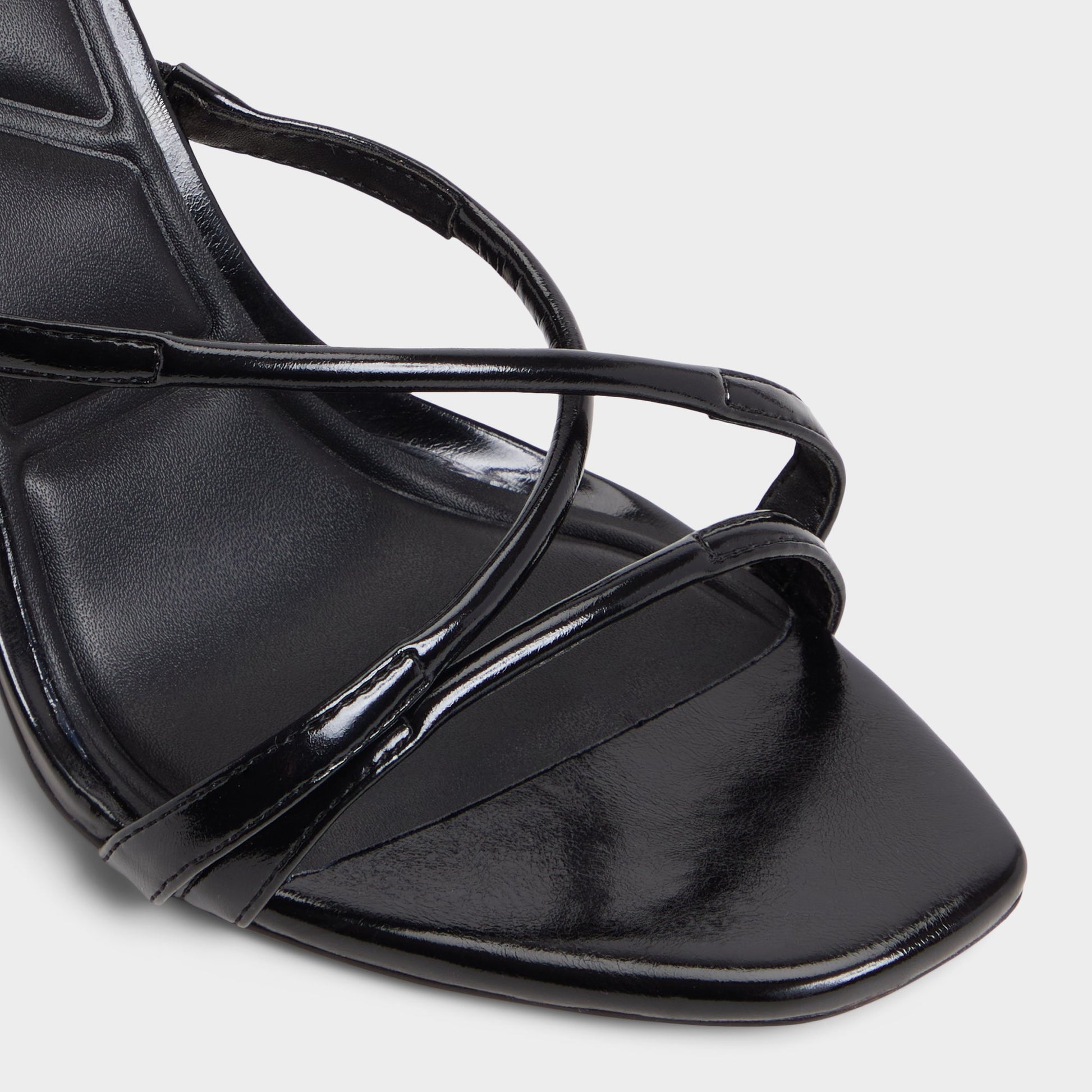 Close-up of the Black Velaia Heeled mule