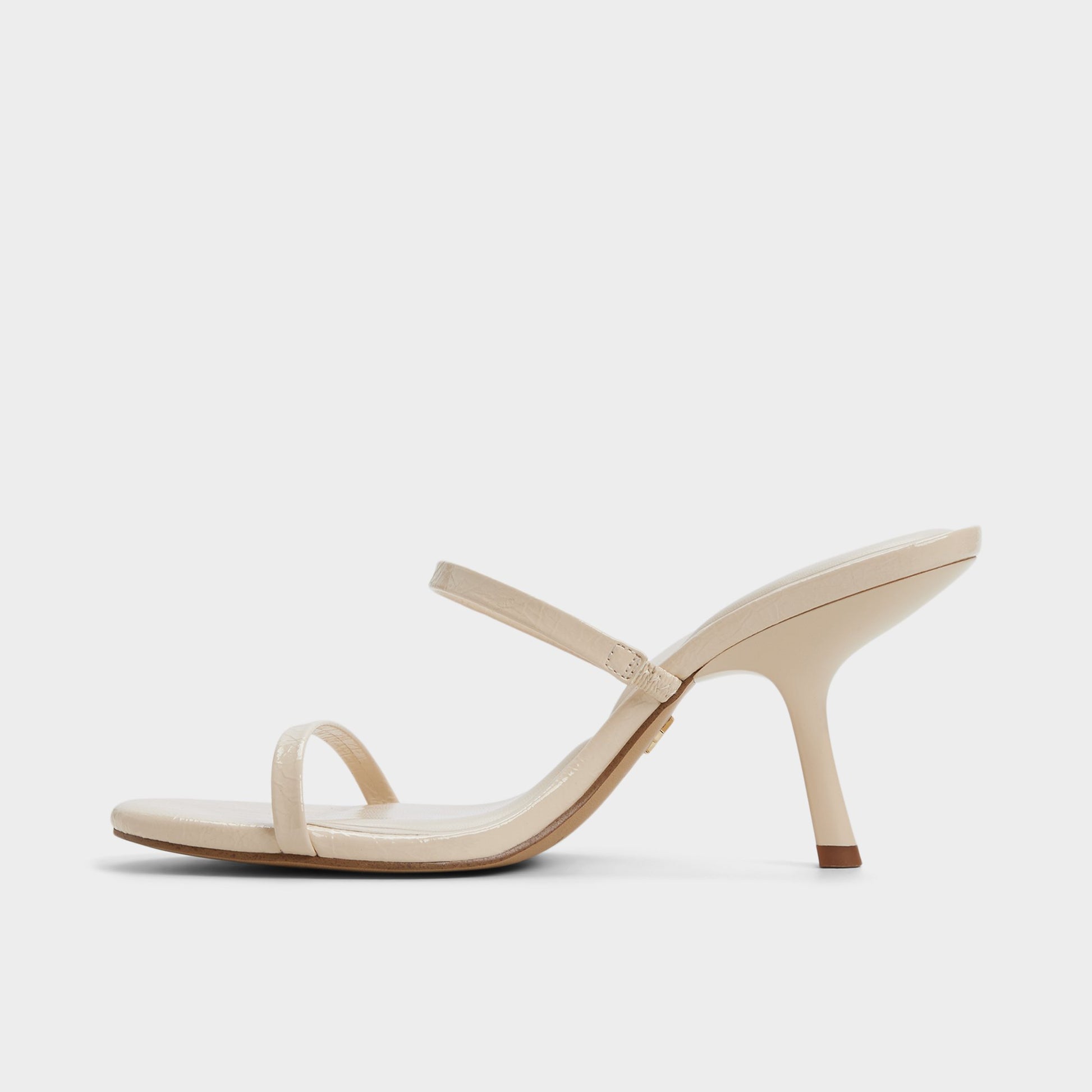 Side view of Cream Avelinda Heeled mule