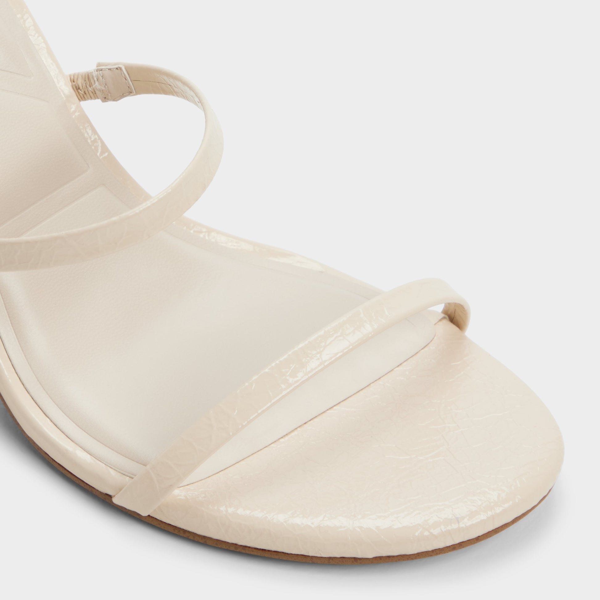 Close-up of the Cream Avelinda Heeled mule