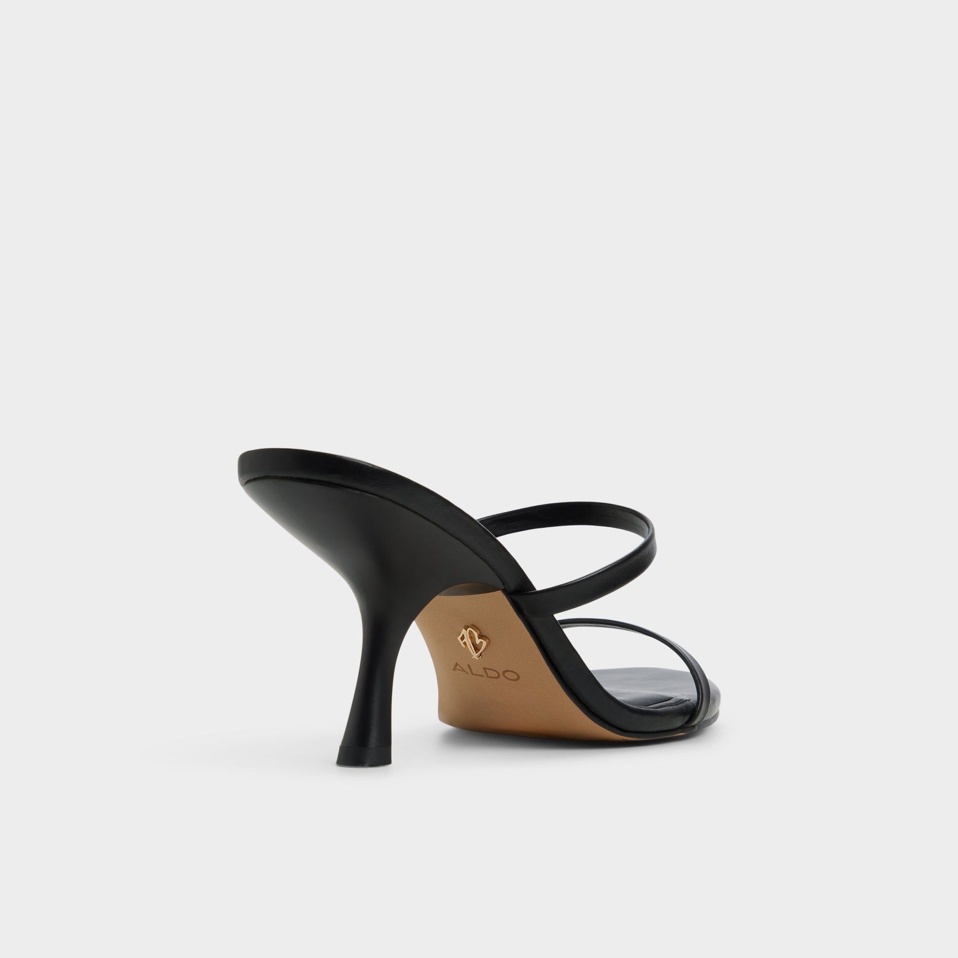 Three-quarter angle of Black Avelinda Heeled mule's back side