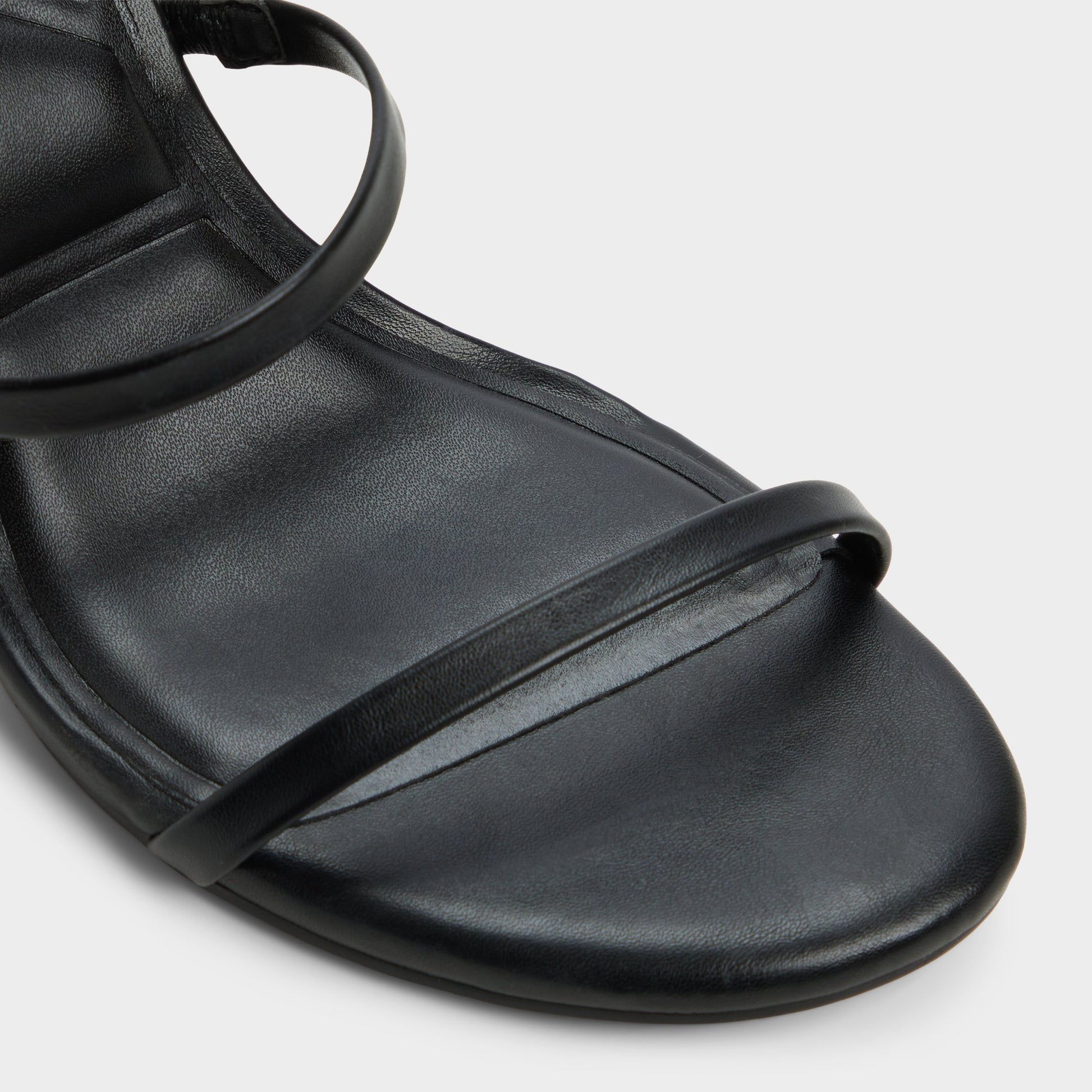 Close-up of the Black Avelinda Heeled mule