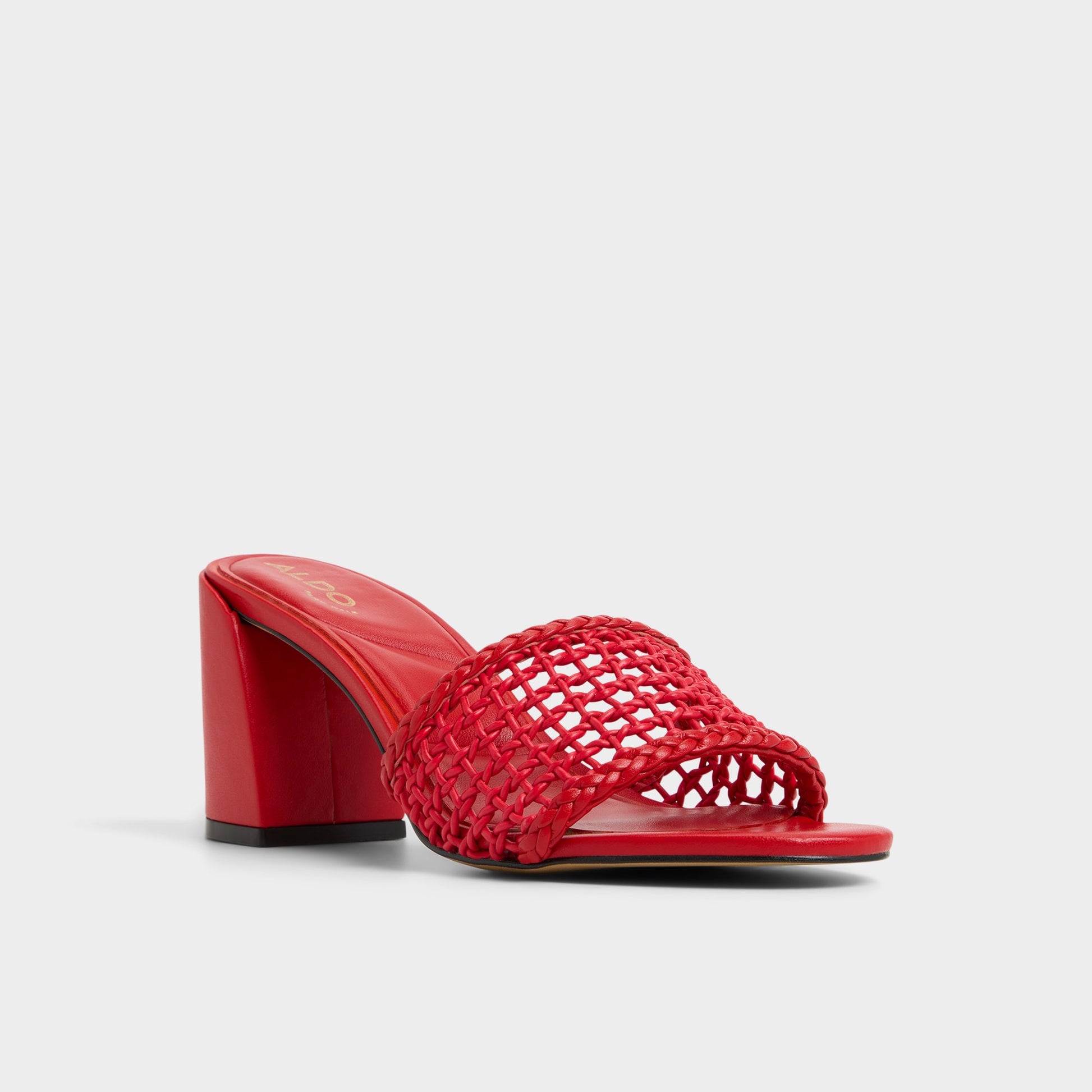 Three-quarter angle of Bright Red Beachdate Heeled mule's front side