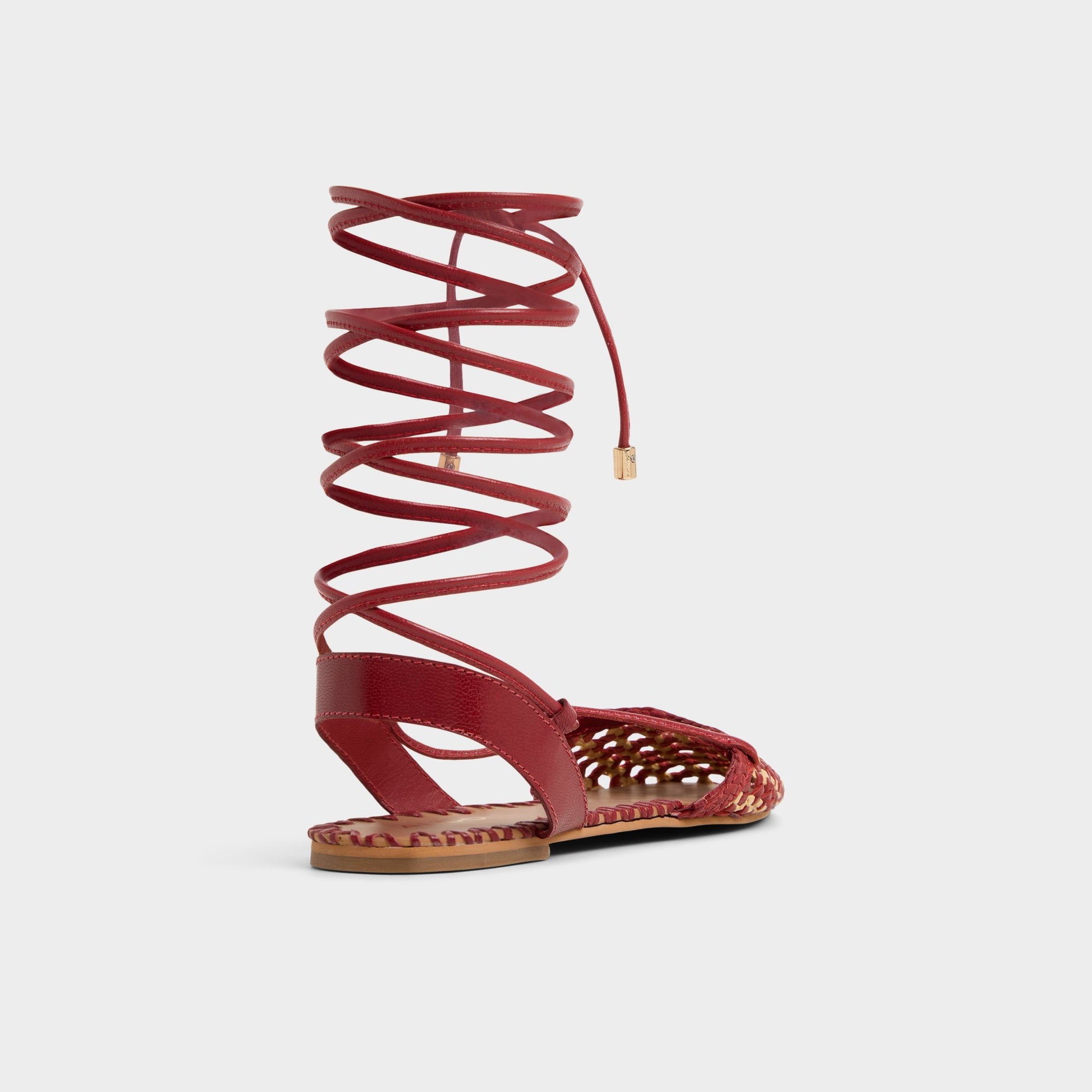 Three-quarter angle of Open Red Dragostee Strappy flat sandal's back side