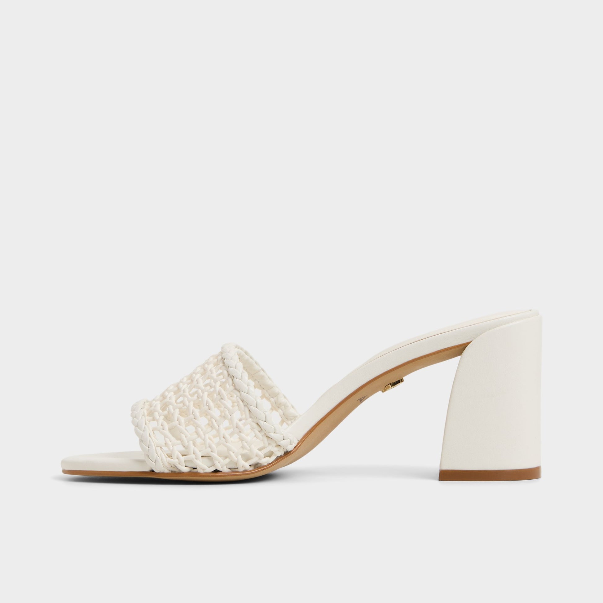 Side view of White/Bone Beachdate Heeled mule
