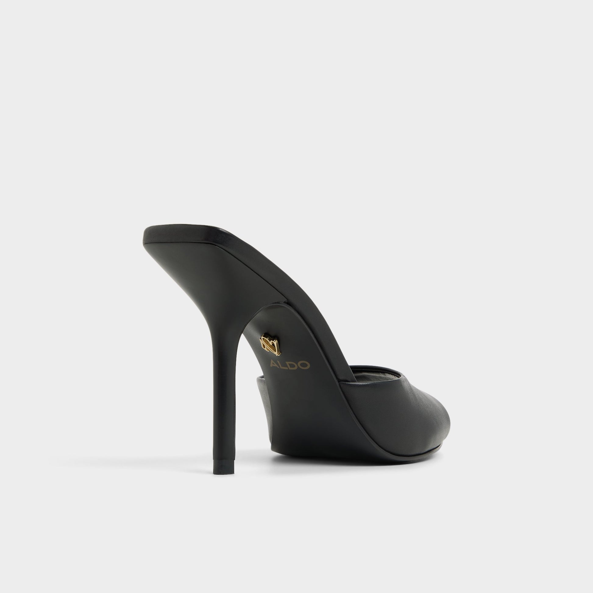 Three-quarter angle of Black Madelan Heeled mule's back side