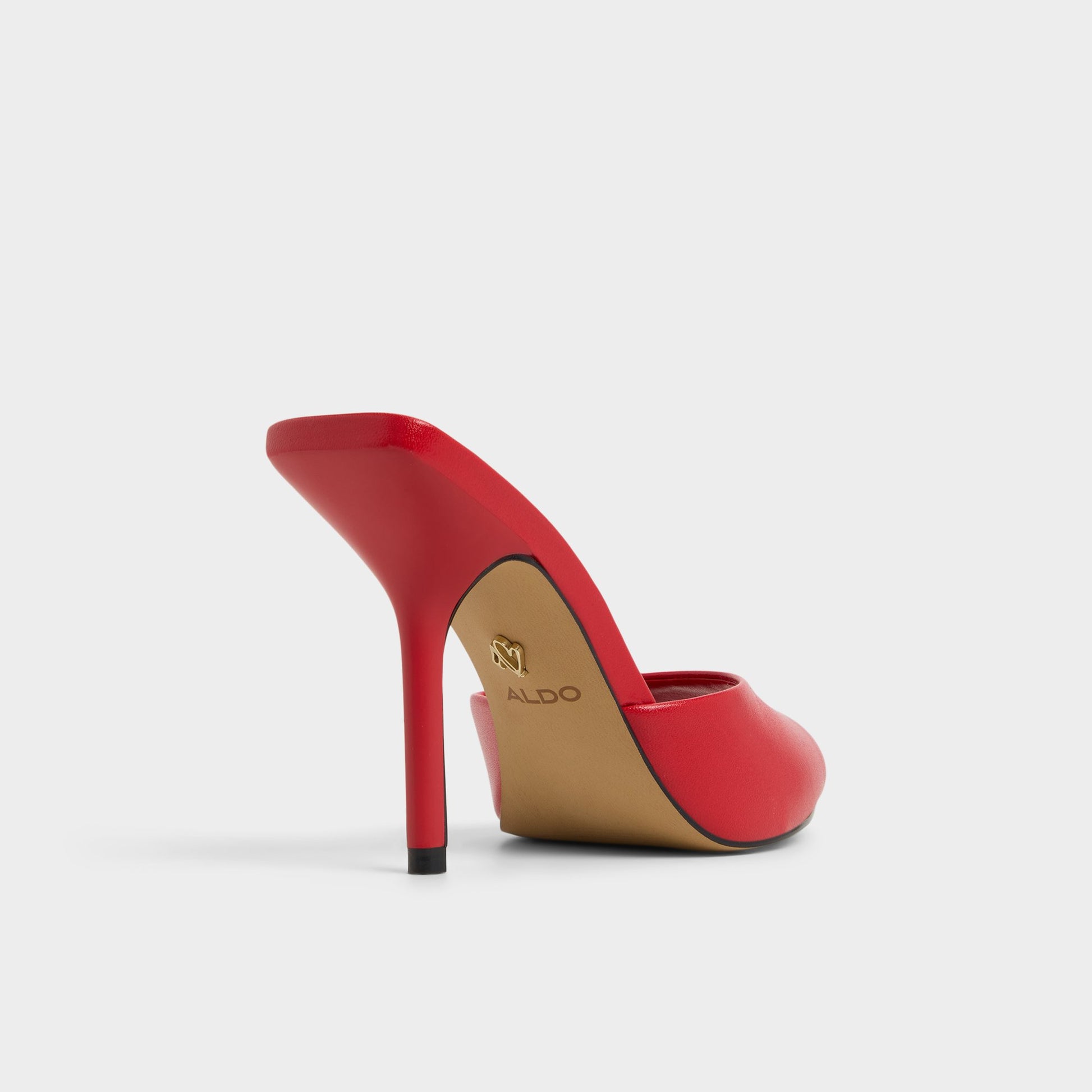 Three-quarter angle of Bright Red Madelan Heeled mule's back side