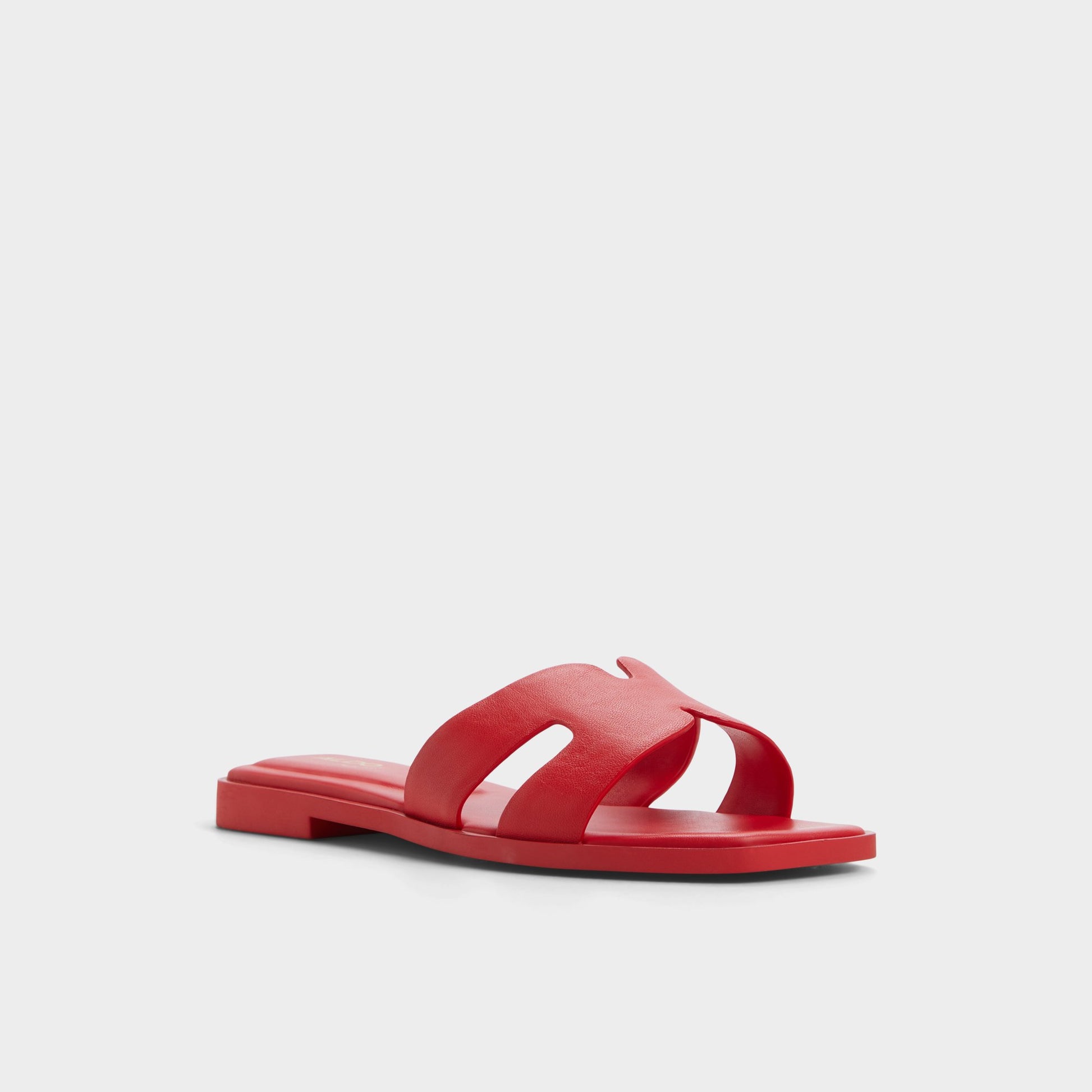 Three-quarter angle of Bright Red Itsandal Slide sandal's front side