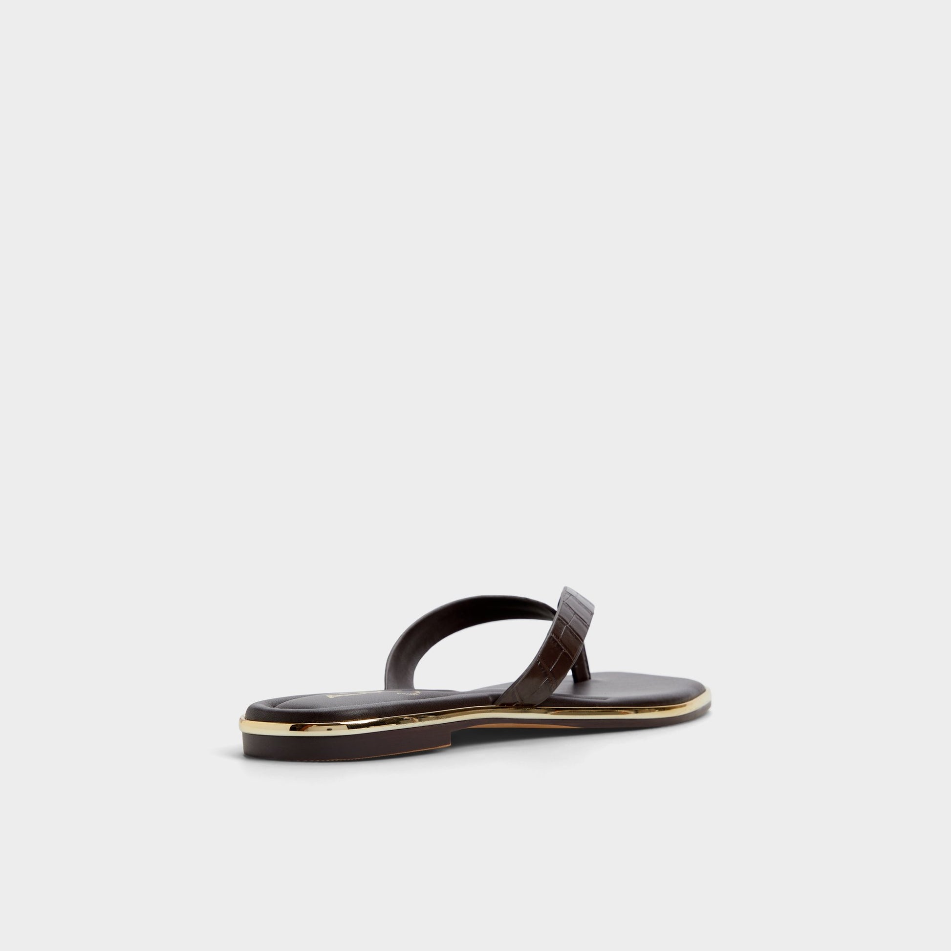 Three-quarter angle of Dark Brown Theao Flip flop's back side