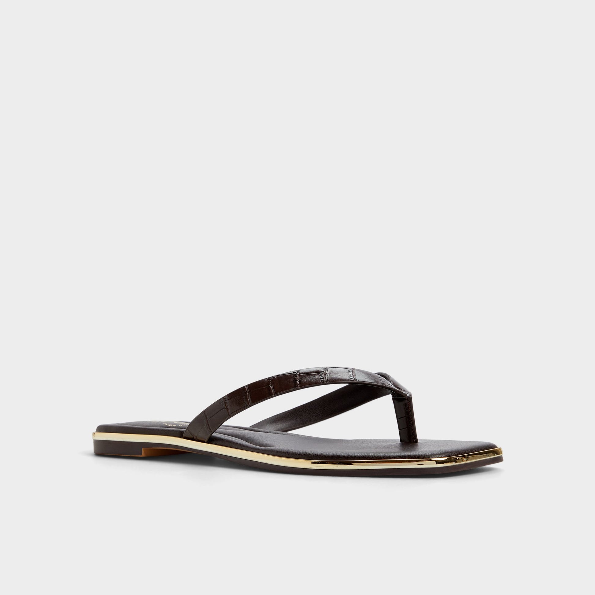 Three-quarter angle of Dark Brown Theao Flip flop's front side