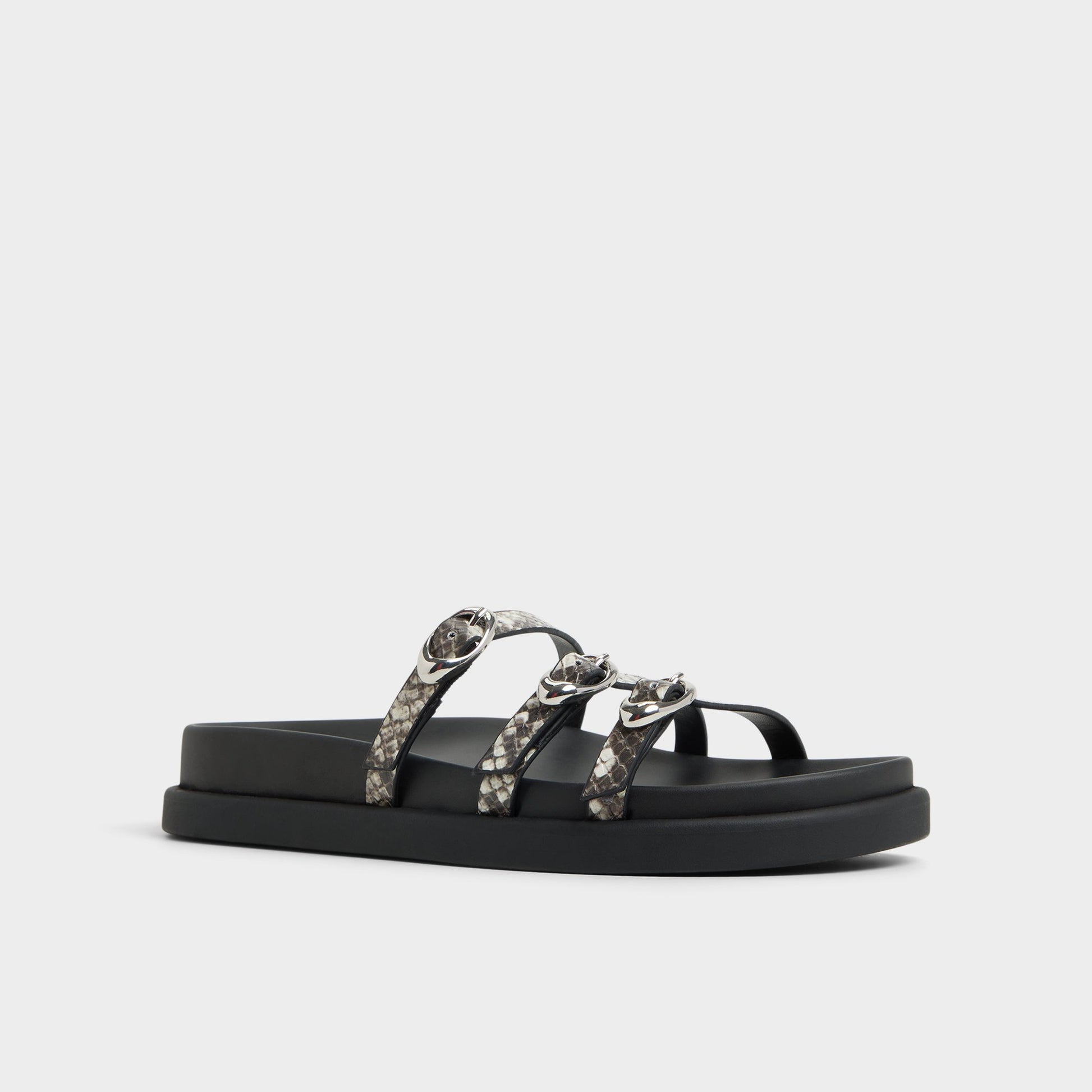 Three-quarter angle of White/Black Zephyra Footbed sandal's front side