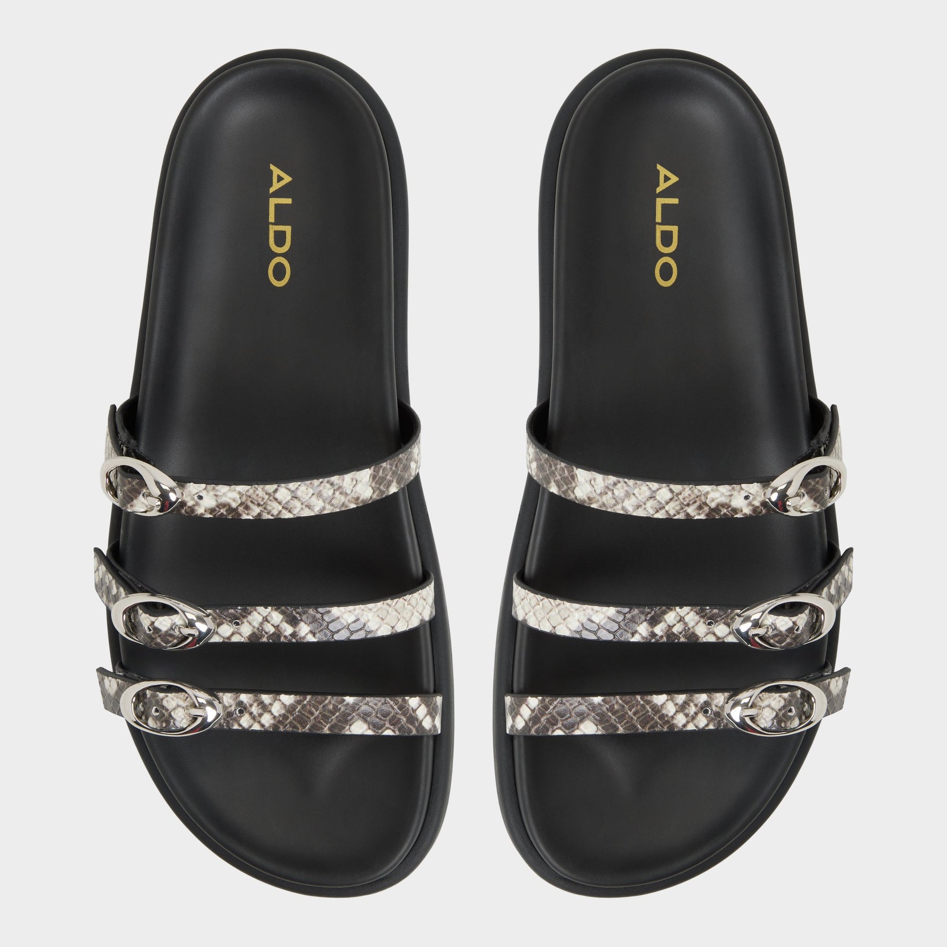 Top-down view of the White/Black Zephyra Footbed sandal