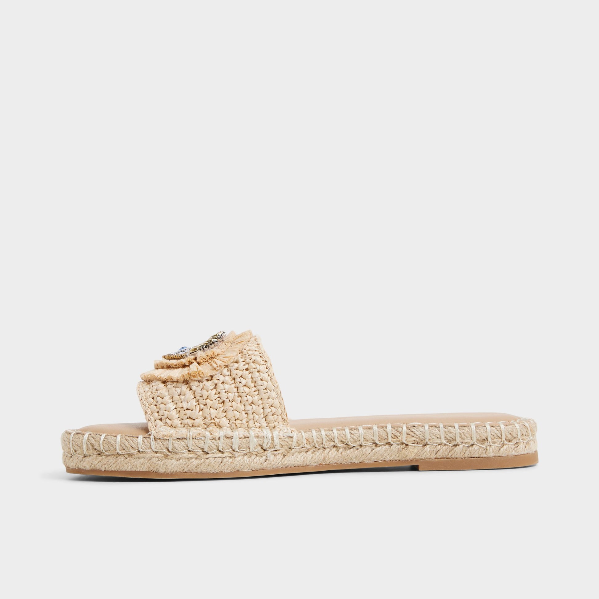 Side view of Natural Nazar Slide sandal