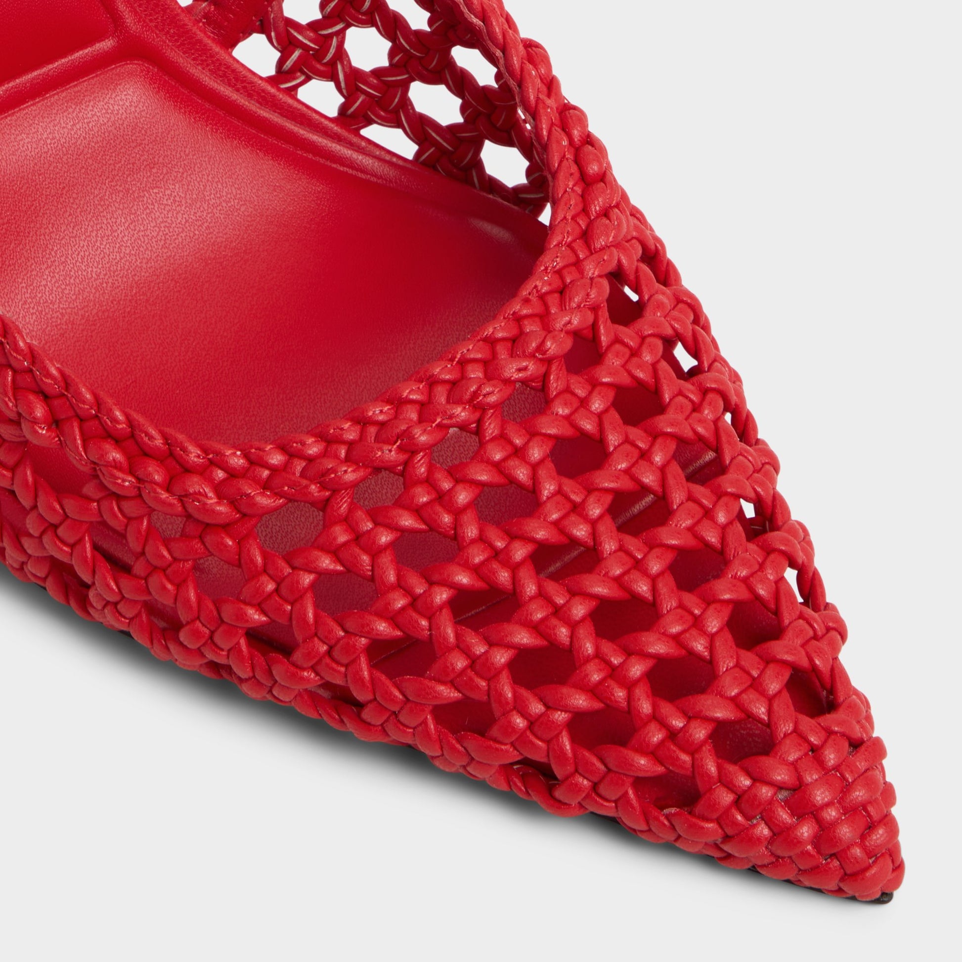 Close-up of the Bright Red Petras Slingback heel