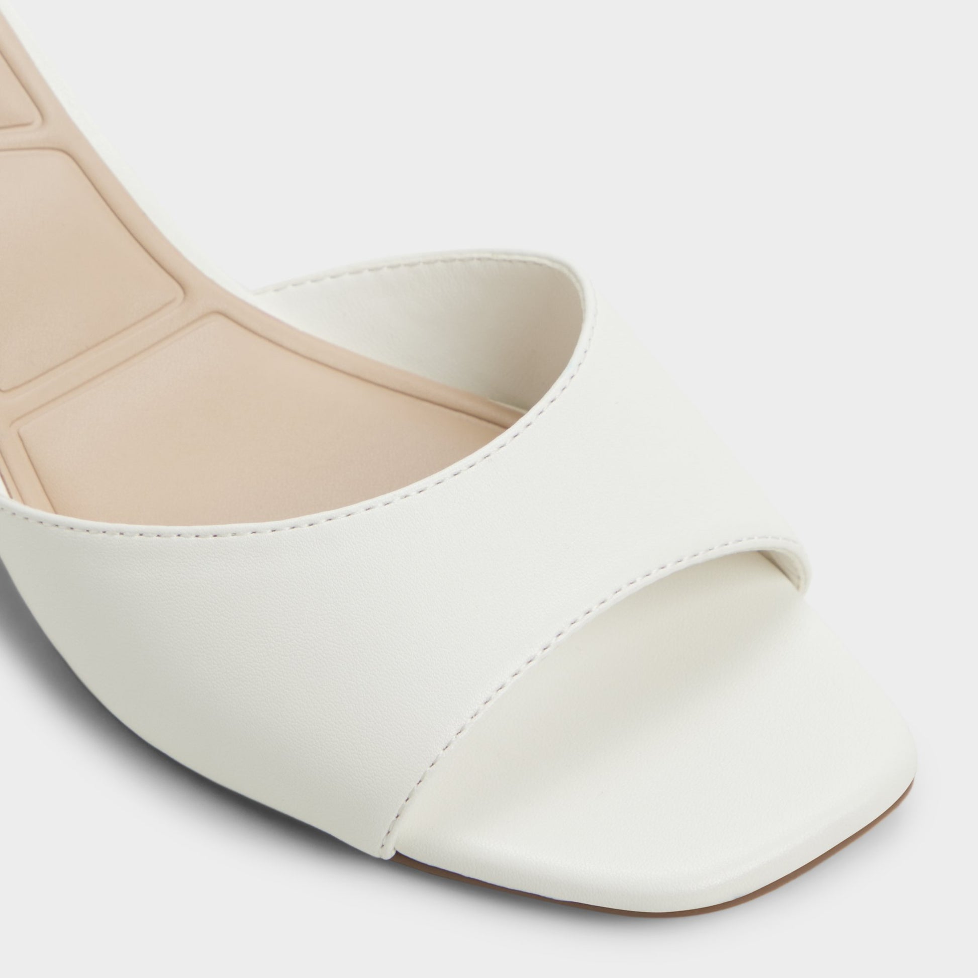 Close-up of the White Haeden Heeled mule