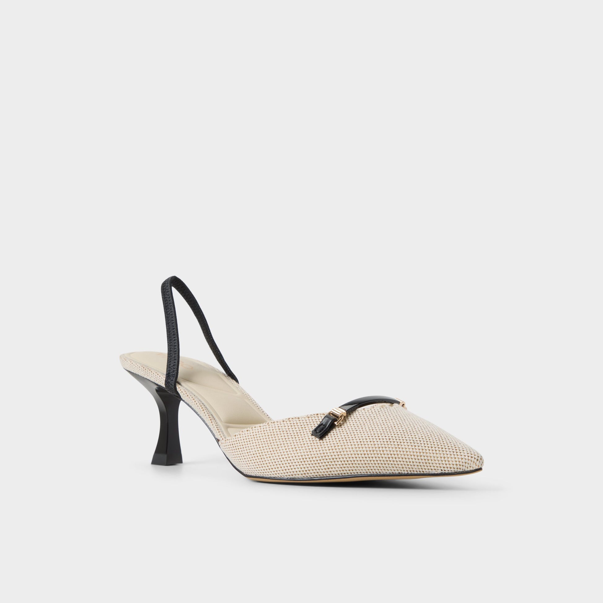 Three-quarter angle of Open Natural Nailah Slingback heel's front side