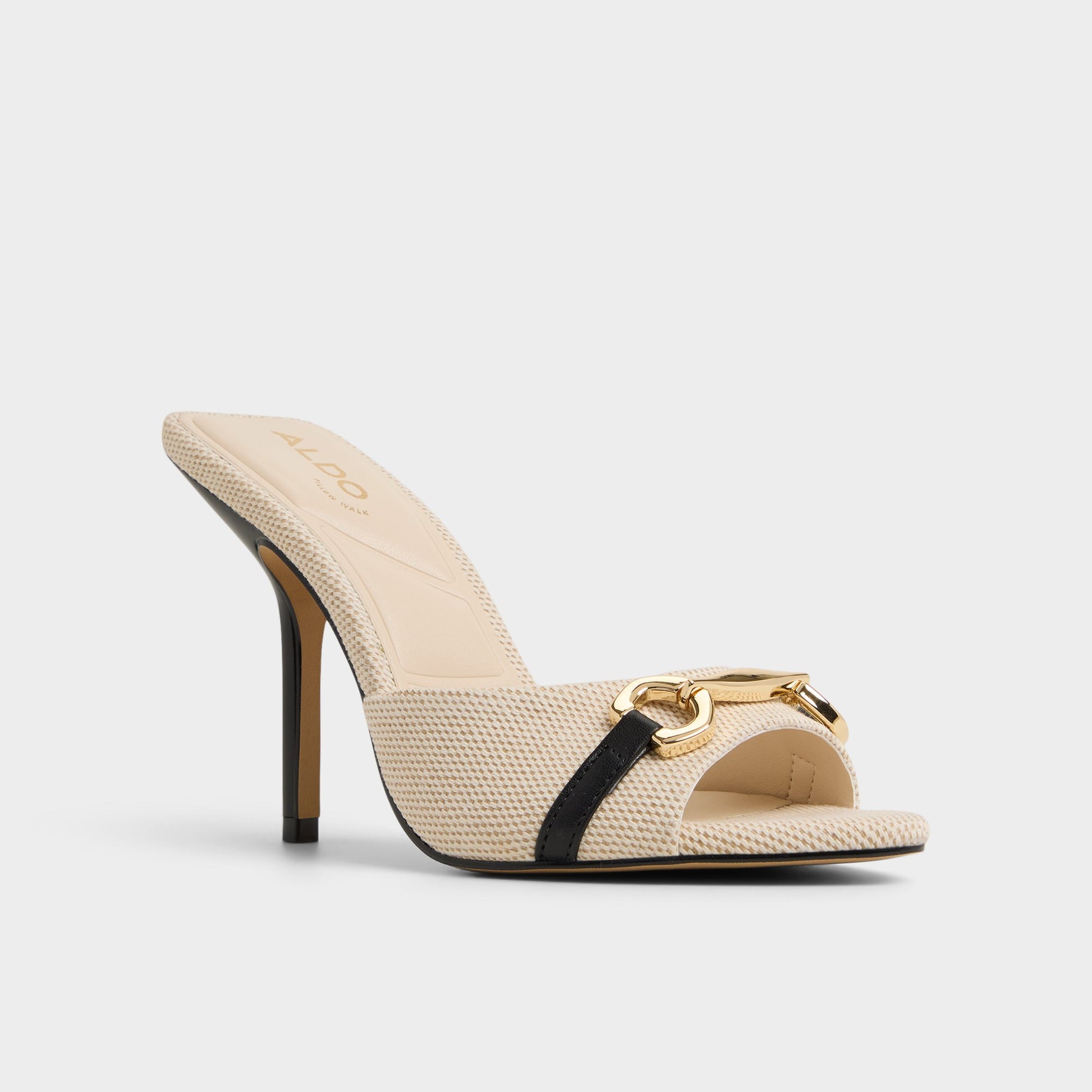 Three-quarter angle of Open Natural Madelynie Heeled mule's front side