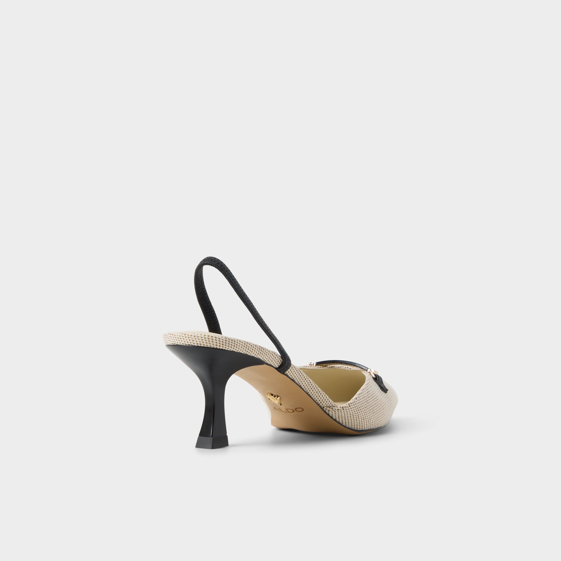 Three-quarter angle of Open natural Nailah Slingback heel's back side