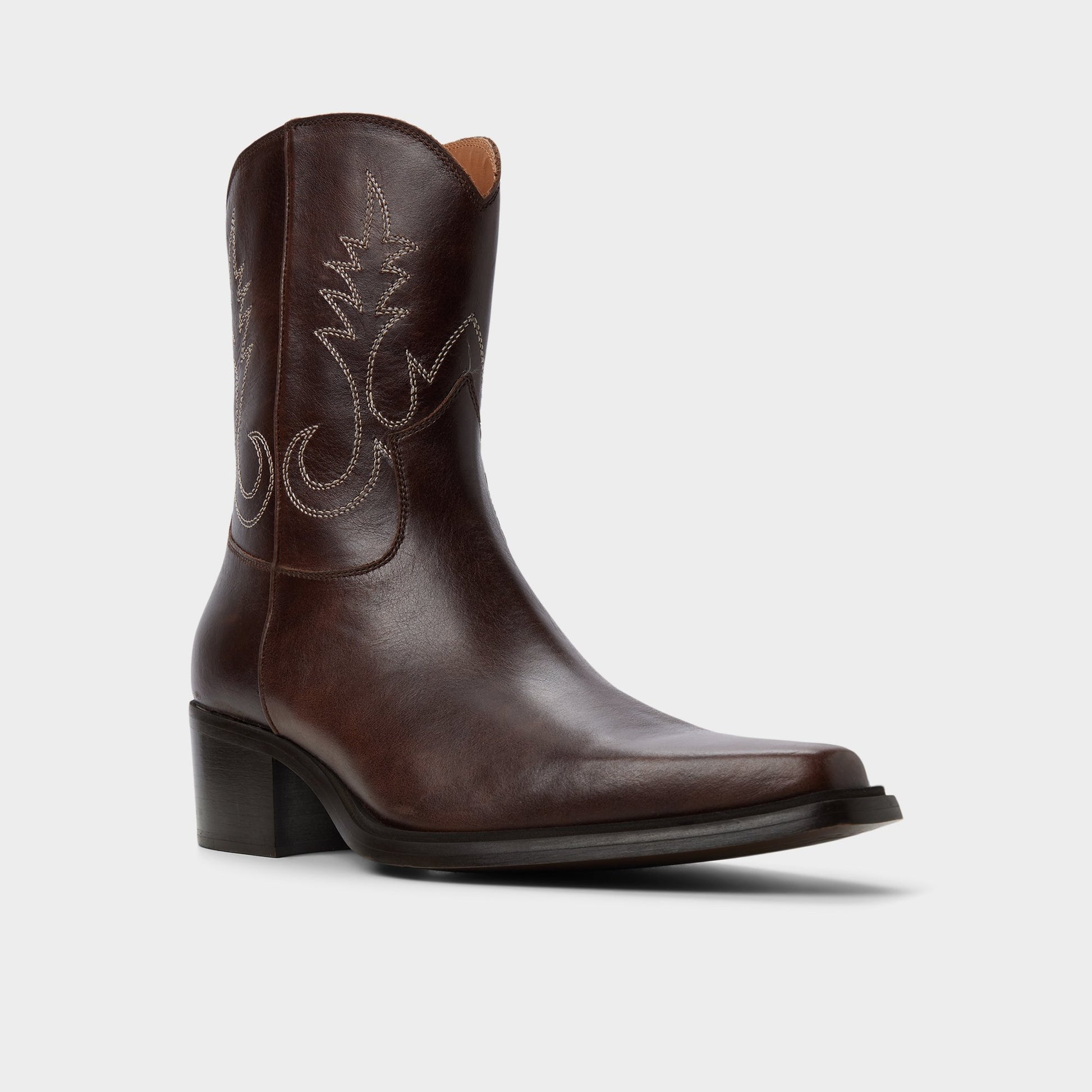Three-quarter angle of Dark Brown Guthrie Ankle boot's front side
