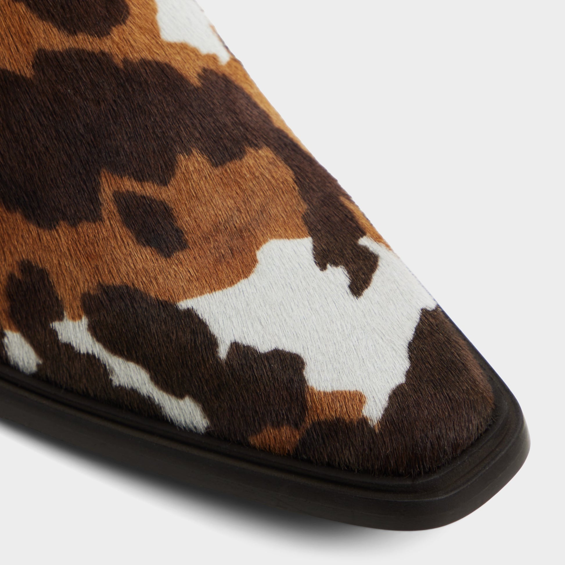 Close-up of the Tan Multi Guthrie Western boot
