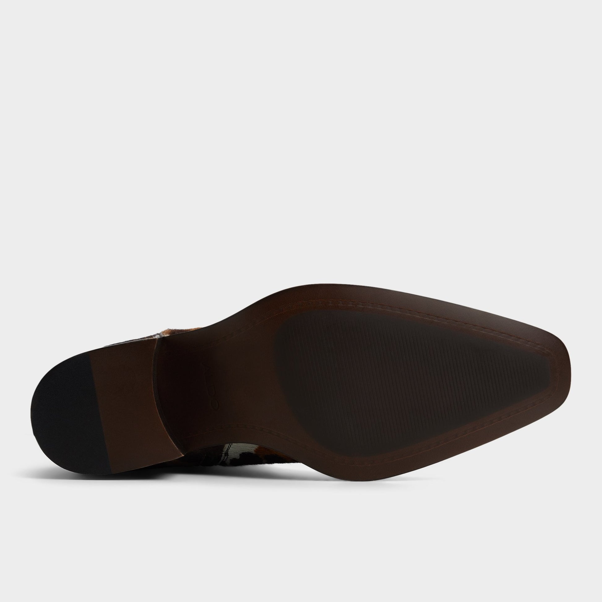 View of Tan Multi Guthrie Western boot's sole
