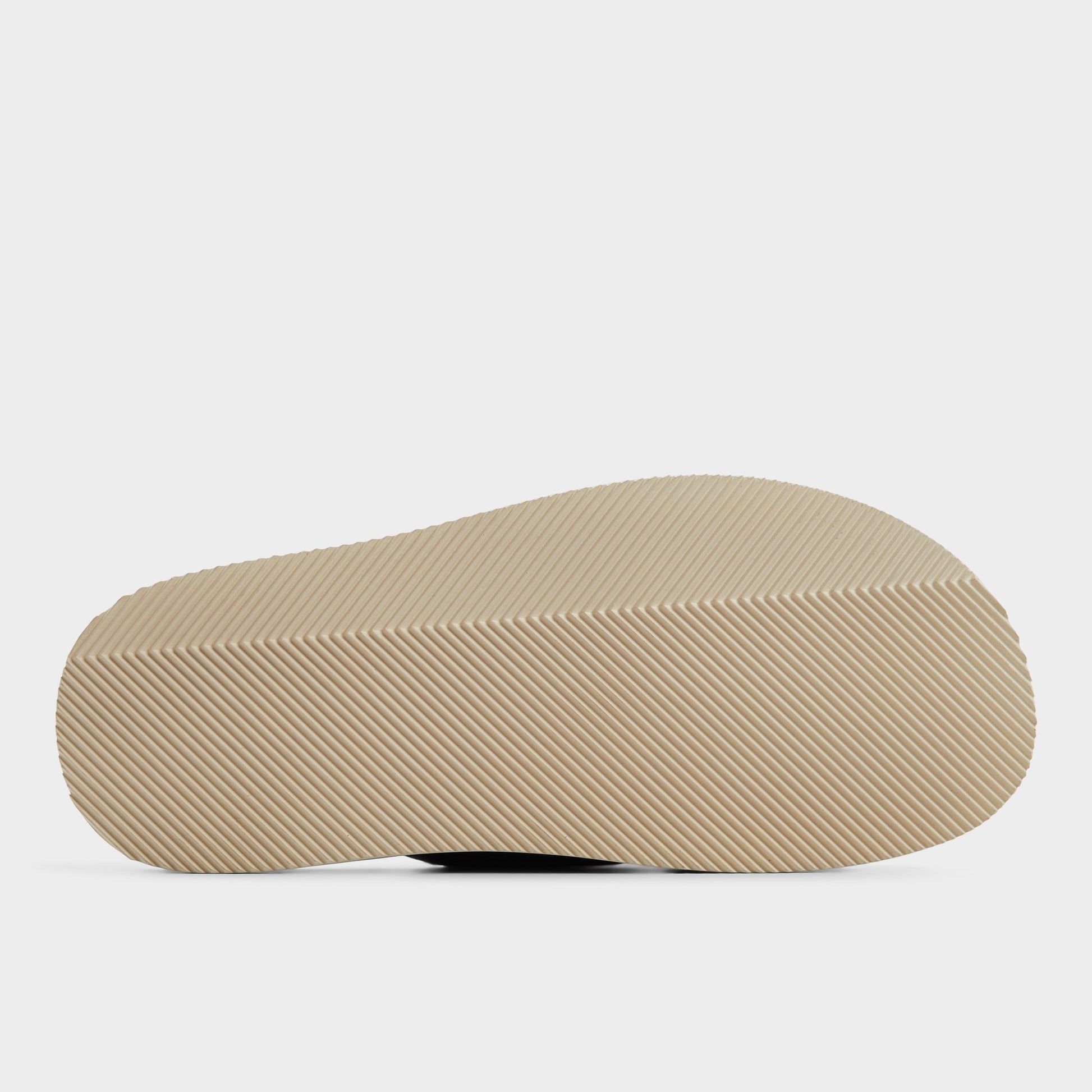 View of Navy Marrin Slide sandal's sole