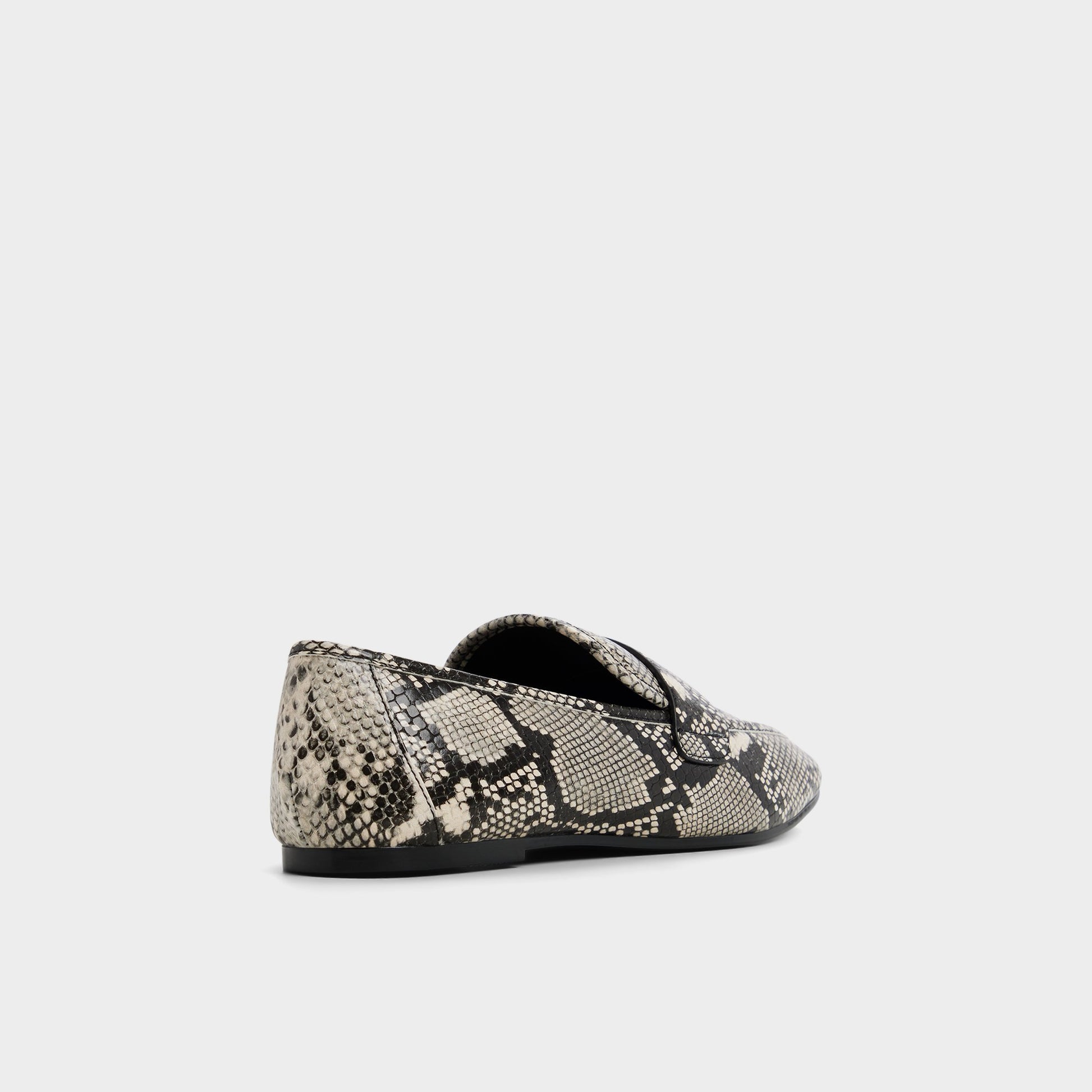 Three-quarter angle of Black/White Bellamyy Loafer's back side