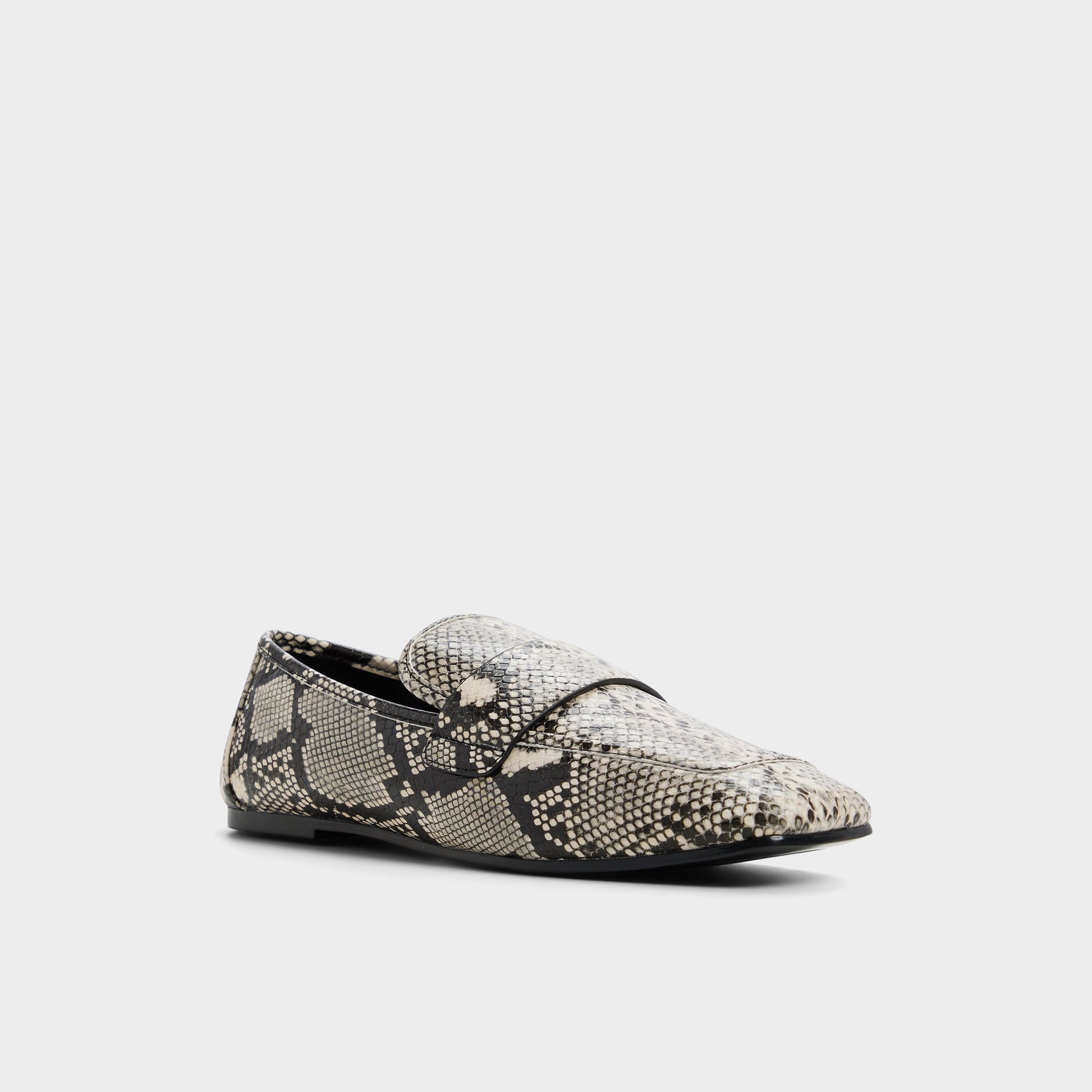 Three-quarter angle of Black/White Bellamyy Loafer's front side