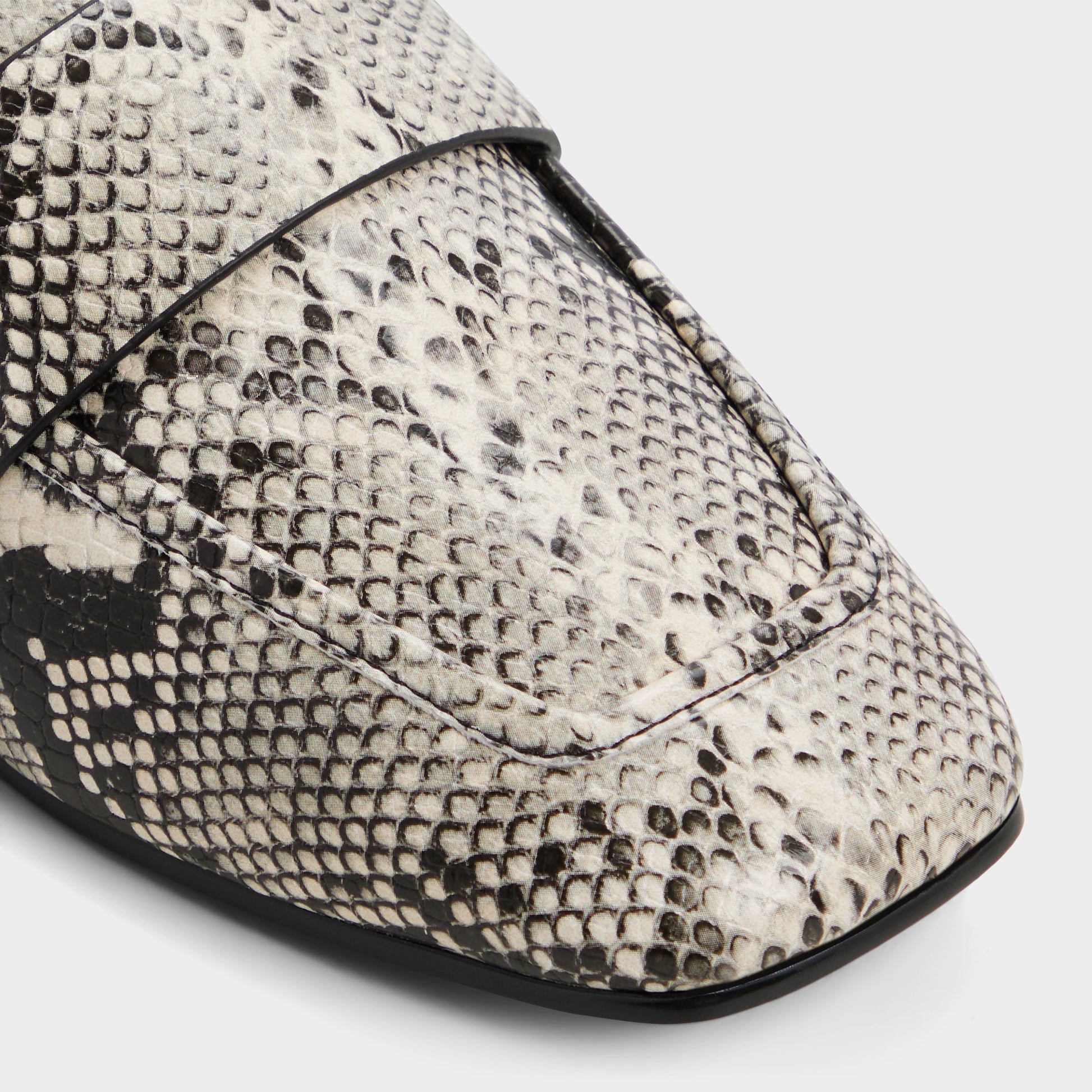 Close-up of the Black/White Bellamyy Loafer