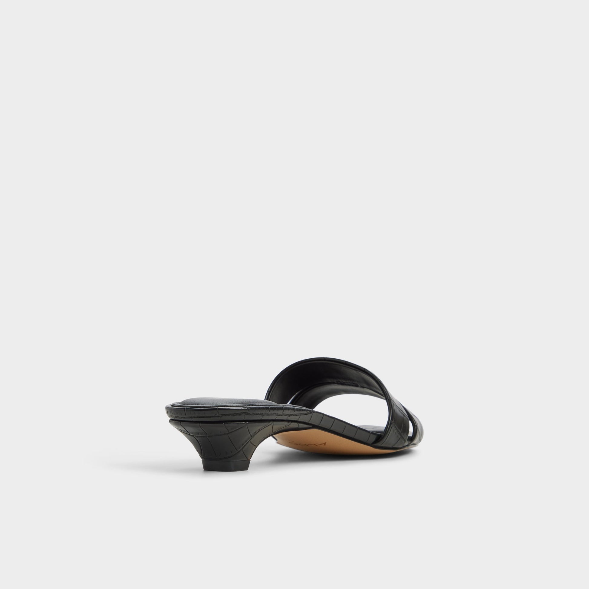 Three-quarter angle of Black Scarletta Heeled mule's back side